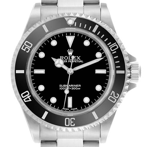 The Rolex Submariner watch is shown from a frontal angle, highlighting the bezel, dial, hands, and part of the metal bracelet.