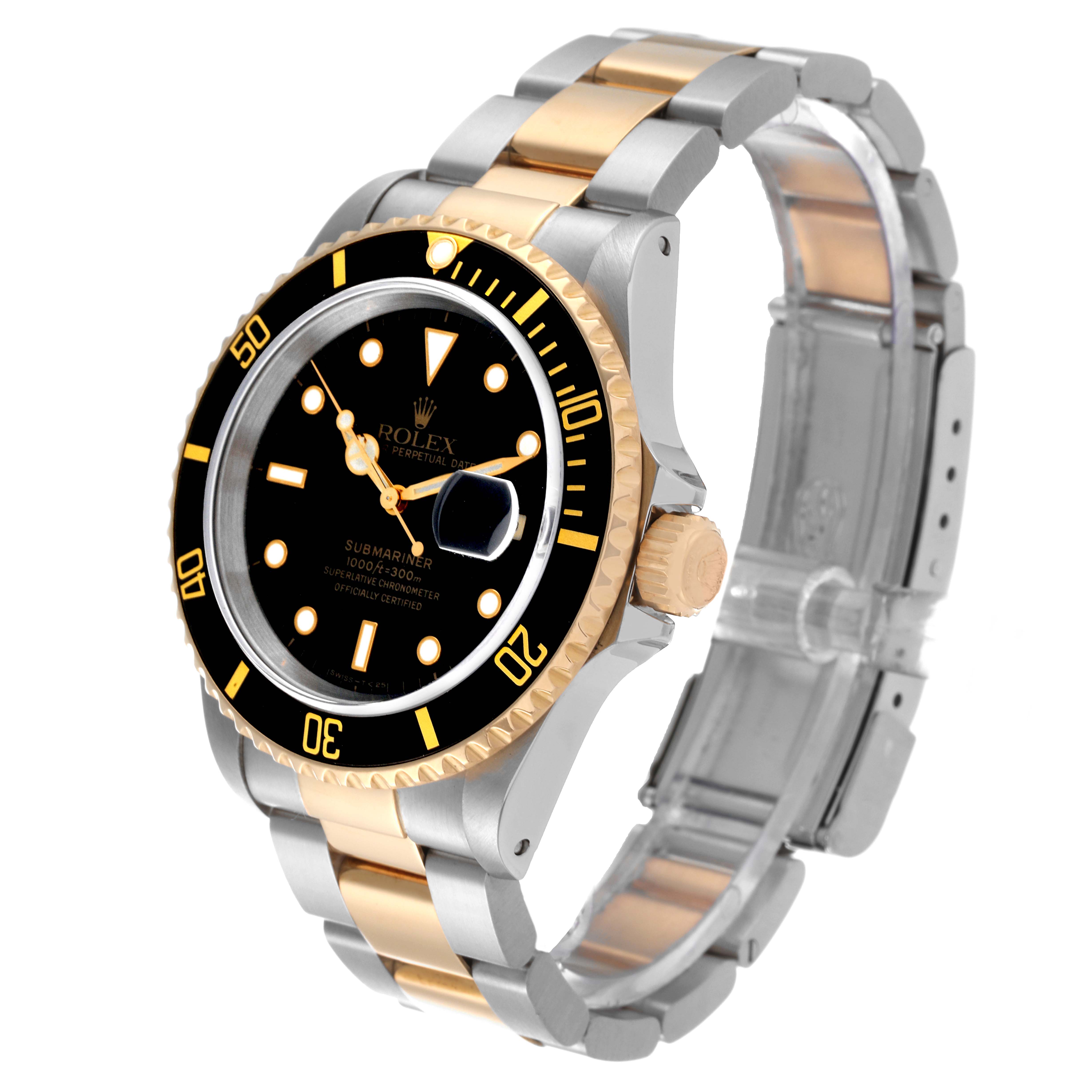 The Rolex Submariner 16613 Men's Steel and Gold (two tone) Black Dial 16613 Men's Steel and Gold (two tone) Black Dial watch is shown at a left side angle, highlighting its black dial, gold bezel, and two-tone bracelet.