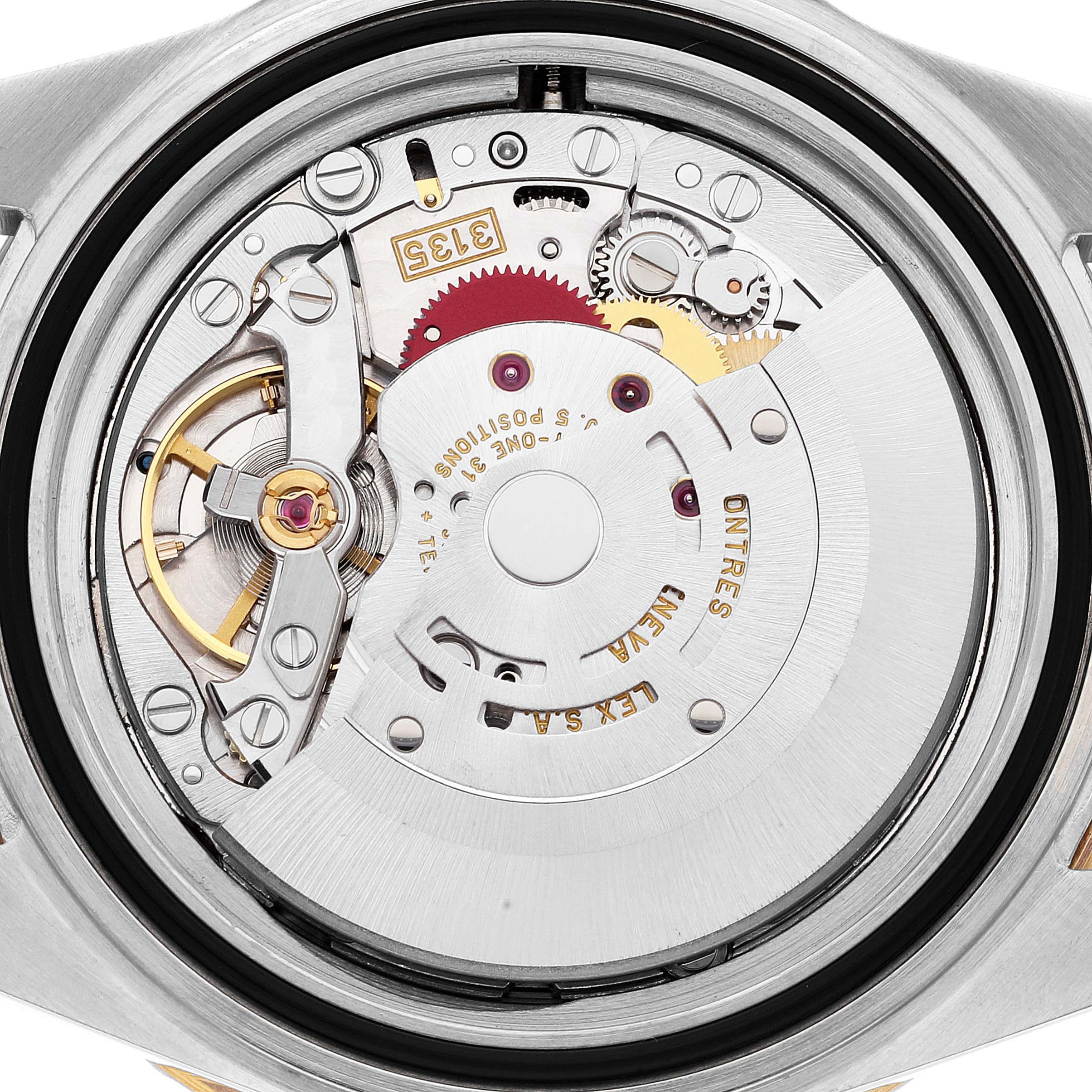 This is an angled view of the movement inside a Rolex Submariner 16613 Men's Steel and Gold (two tone) Champagne Dial 16613 Men's Steel and Gold (two tone) Champagne Dial watch, showcasing its intricate mechanical components.
