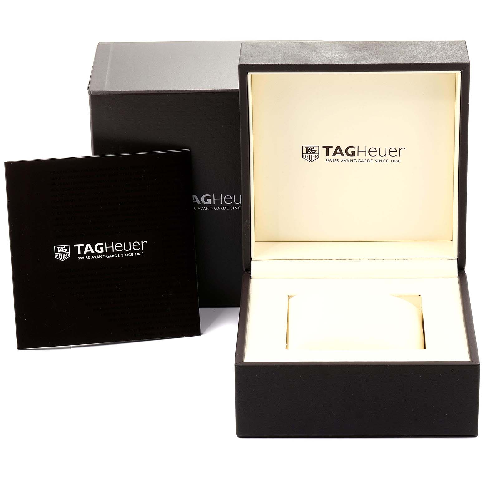 The image shows an open TAG Heuer watch box for a Carrera model, along with its outer packaging and an instruction booklet.