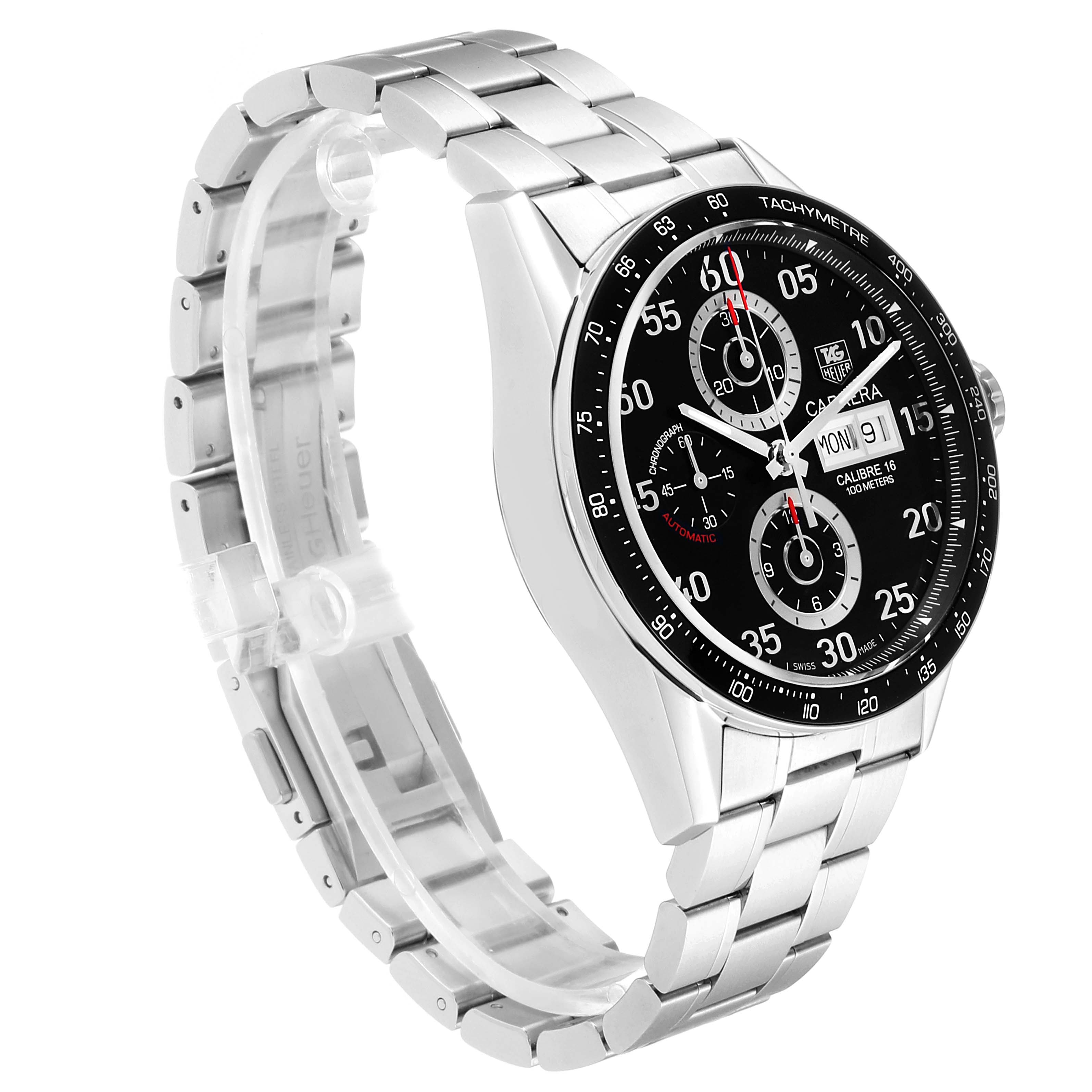 The image shows a tilted side view of the Tag Heuer Carrera CV2A10.BA0796 Men
s Stainless Steel Black Dial CV2A10.BA0796 Men
s Stainless Steel Black Dial watch, highlighting its dial, bezel, and stainless steel bracelet.