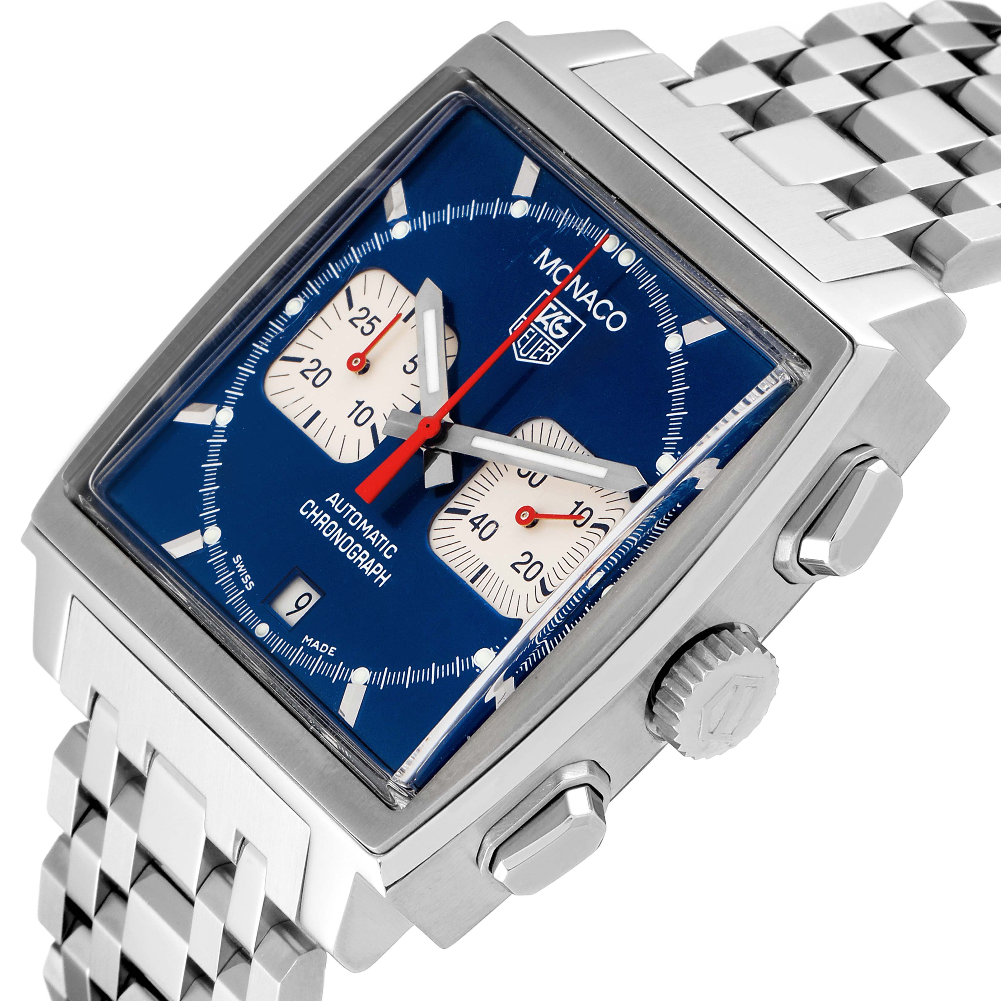 The image shows a close-up angle of the Tag Heuer Monaco CW2113.BA0780 Men's Stainless Steel Blue Dial CW2113.BA0780 Men's Stainless Steel Blue Dial watch's face, crown, pushers, and part of the stainless steel bracelet.