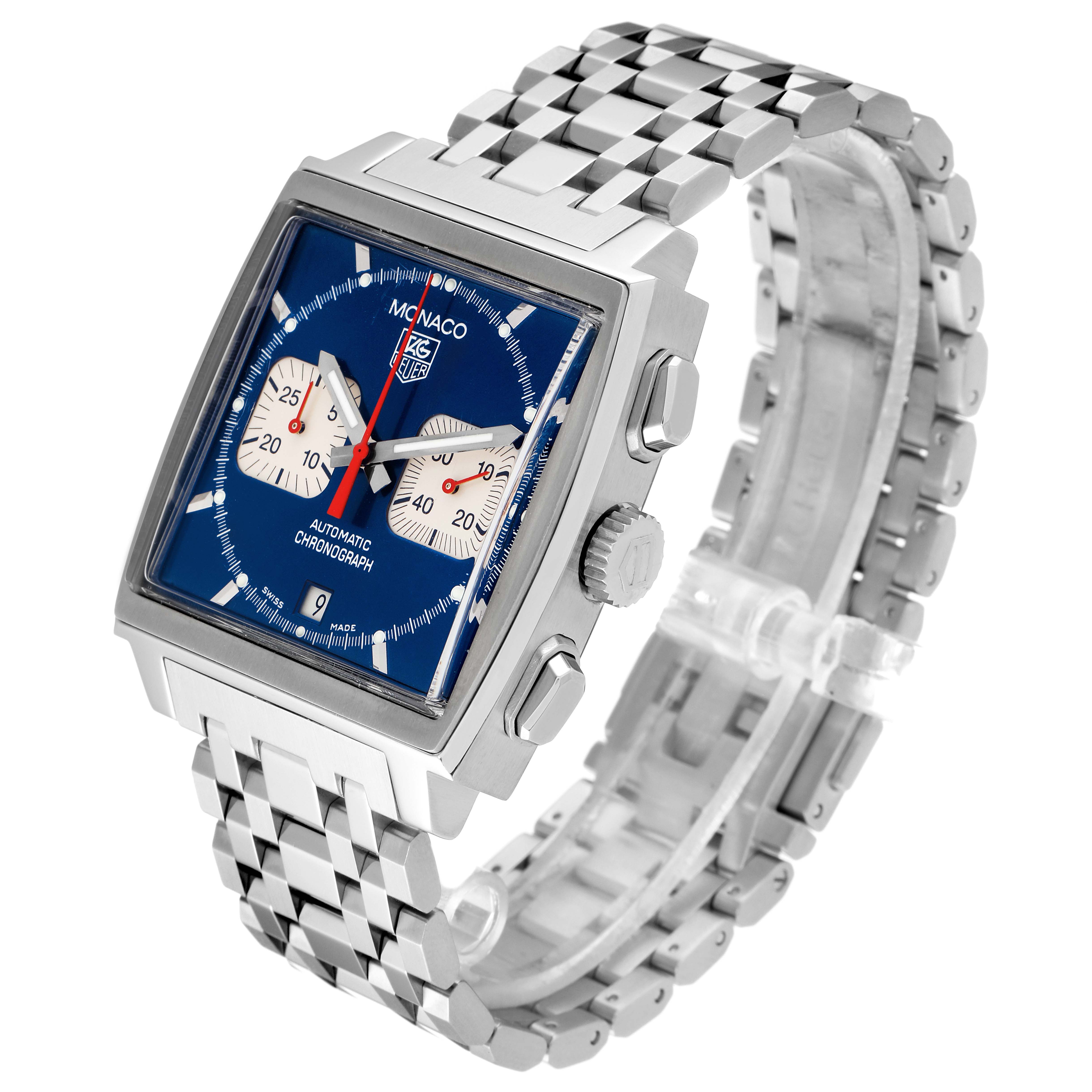 The image shows a Tag Heuer Monaco CW2113.BA0780 Men's Stainless Steel Blue Dial CW2113.BA0780 Men's Stainless Steel Blue Dial watch at an angled view, highlighting its face, side buttons, crown, and metal bracelet.