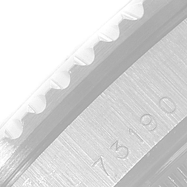 This image shows a close-up view of the bezel's edge and part of the casing with the serial number of the Tudor Prince model watch.