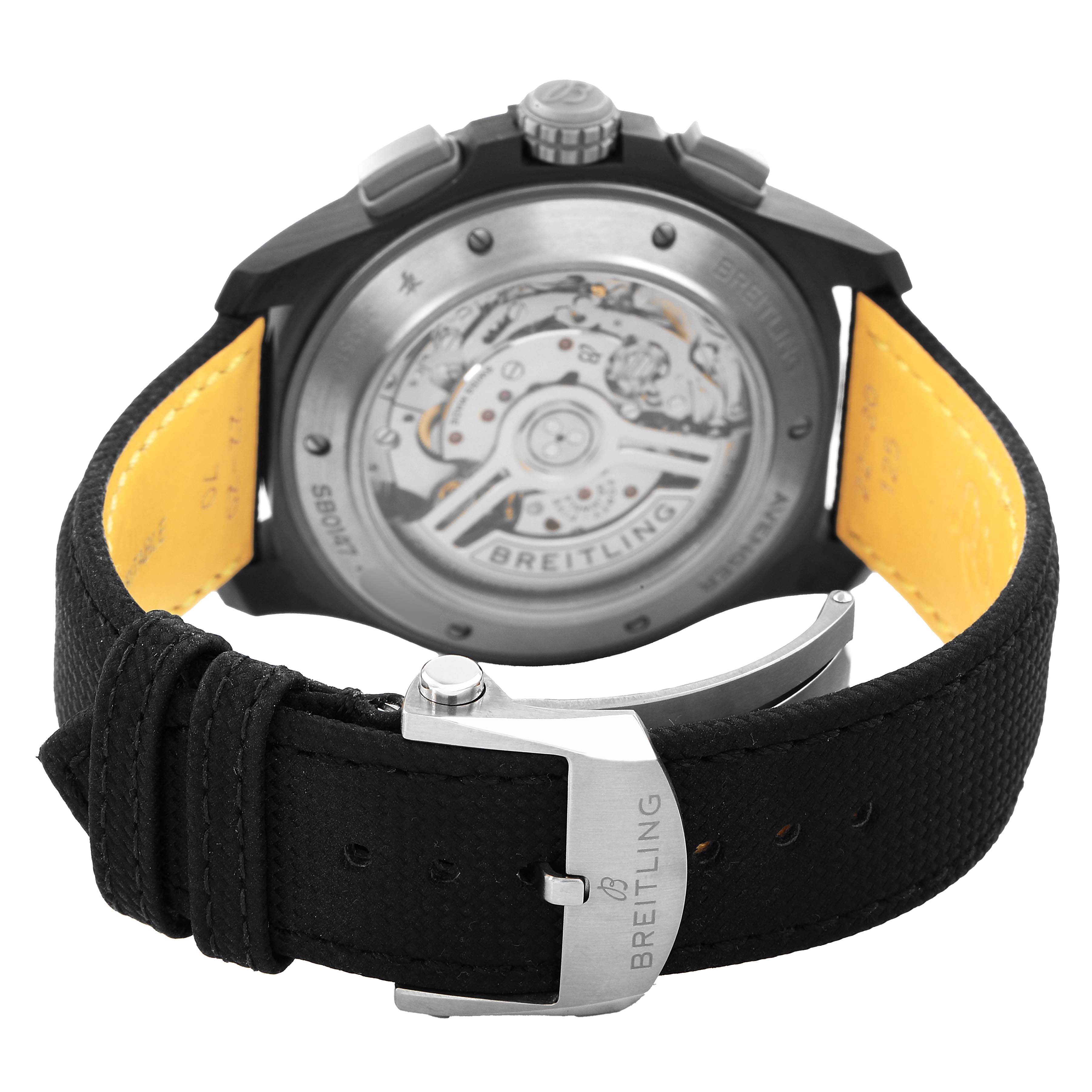 The image shows the back of the Breitling Avenger SB0147 Men's Ceramic Black Dial watch, highlighting the automatic movement and clasp with branding.