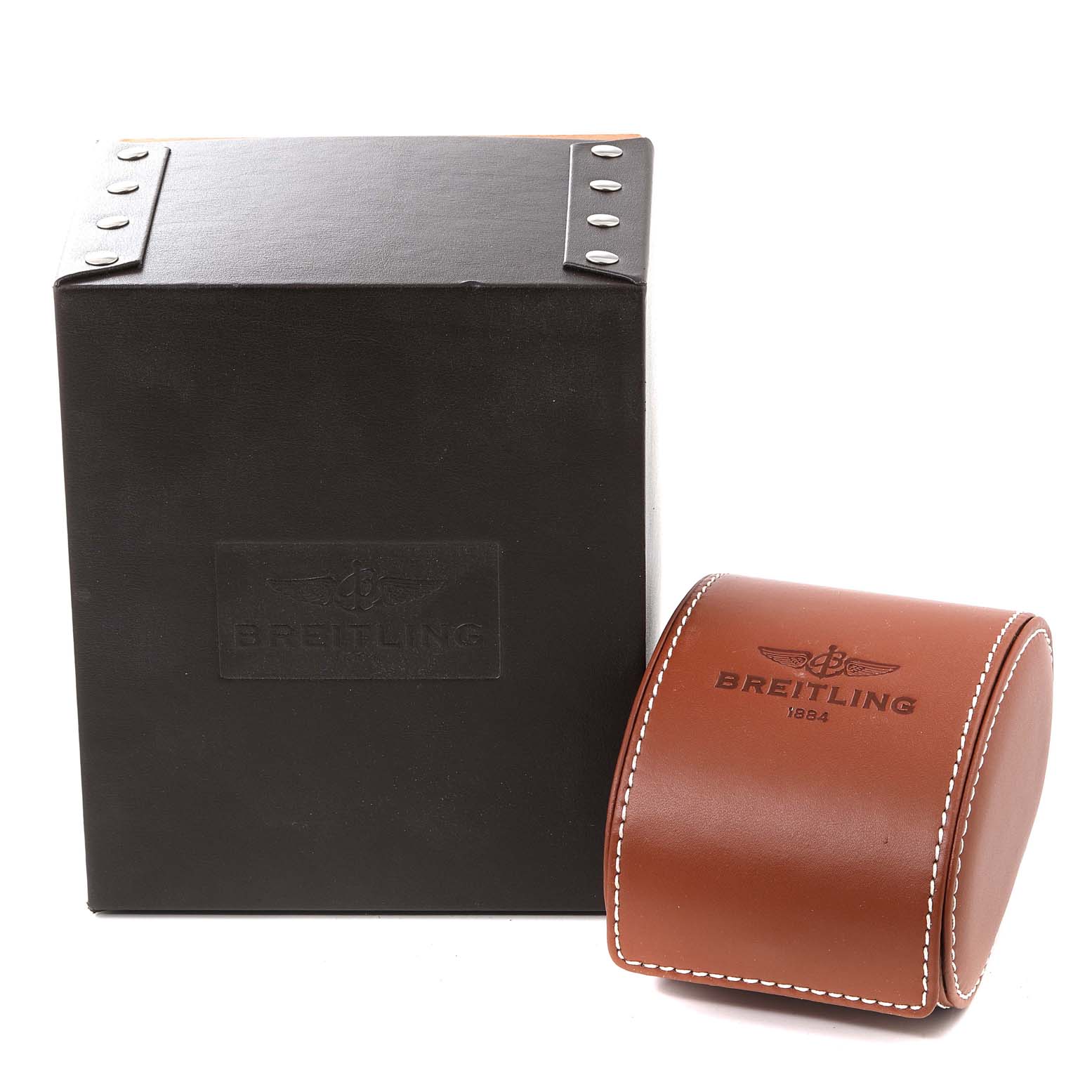 The image shows the Breitling Avenger A17331 Men's Stainless Steel Yellow Dial A17331 Men's Stainless Steel Yellow Dial watch box and a brown leather travel case with Breitling branding.