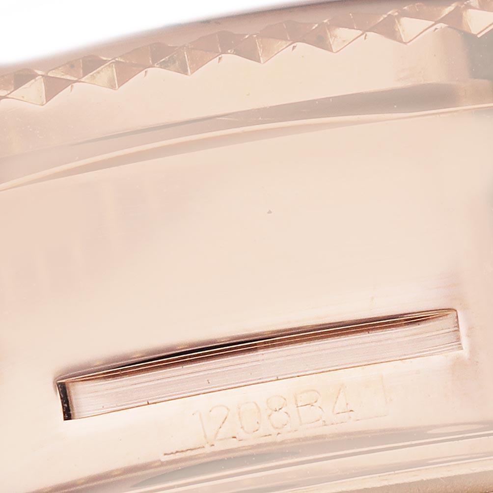 The image shows a close-up of the Bentley model by Breitling, focusing on the bezel with visible texture and a partial reference number.
