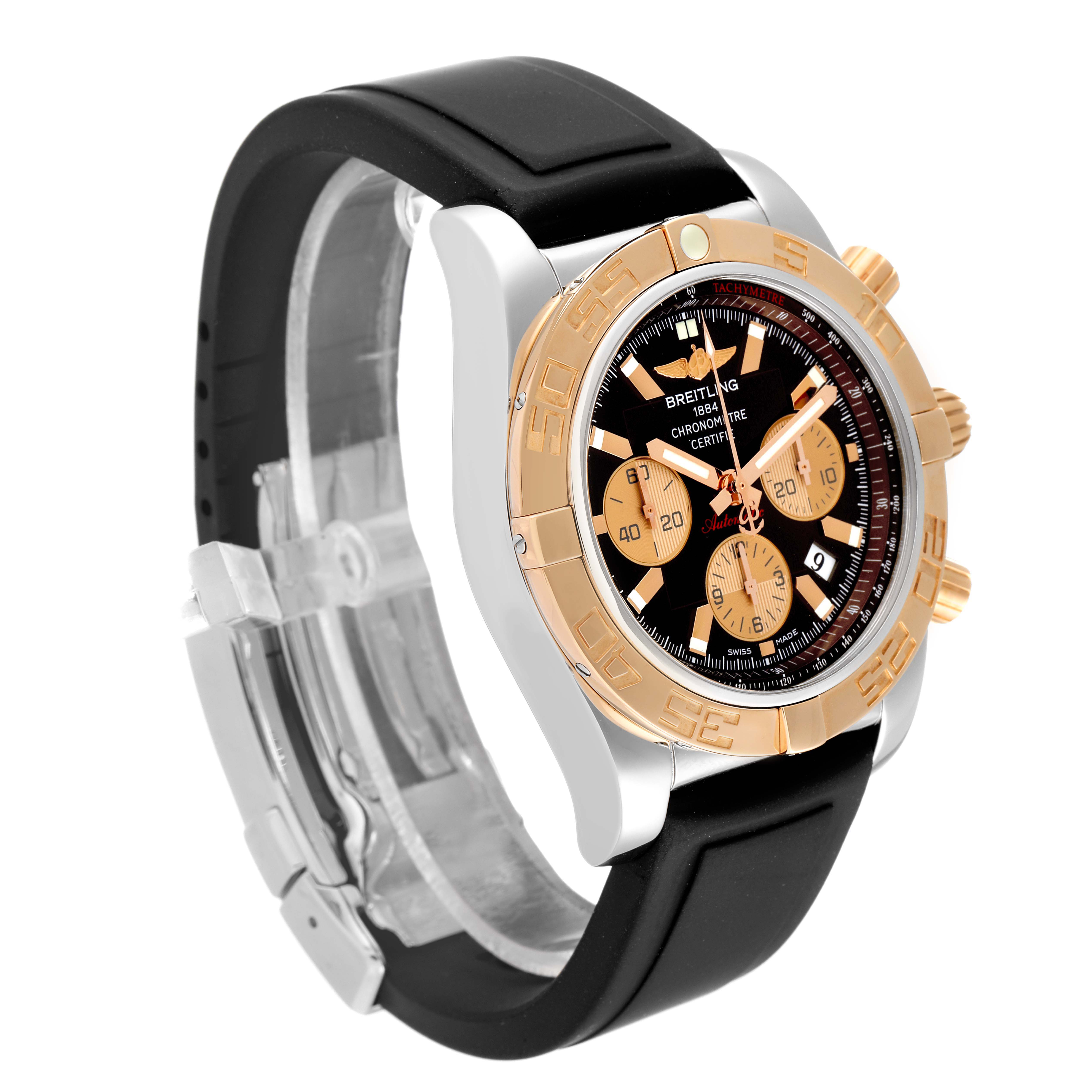 This image shows a side and front angle of a Breitling Chronomat CB0110 Men's Steel and Gold (two tone) Brown Dial CB0110 Men's Steel and Gold (two tone) Brown Dial watch featuring a black strap and gold accents.
