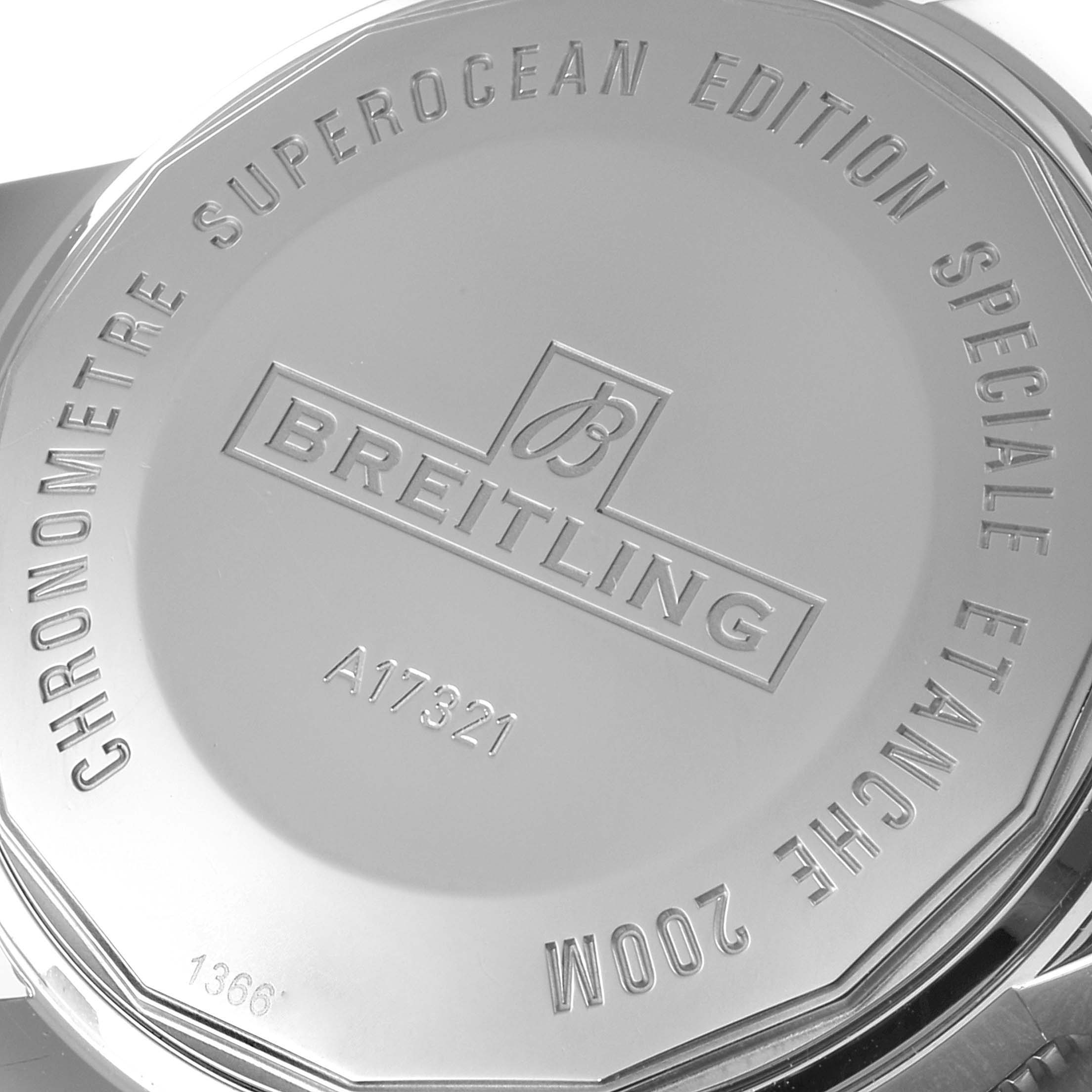 The image shows the back case of a Breitling Transocean watch, highlighting engraved details and branding.