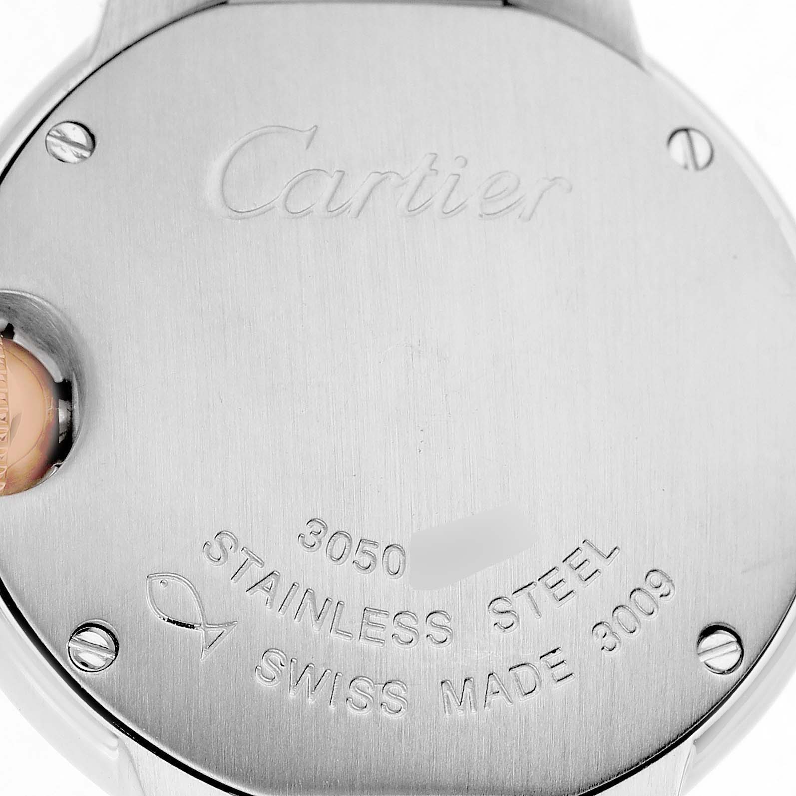 The image shows the back of the Ballon Bleu by Cartier, highlighting its stainless steel case and engravings.
