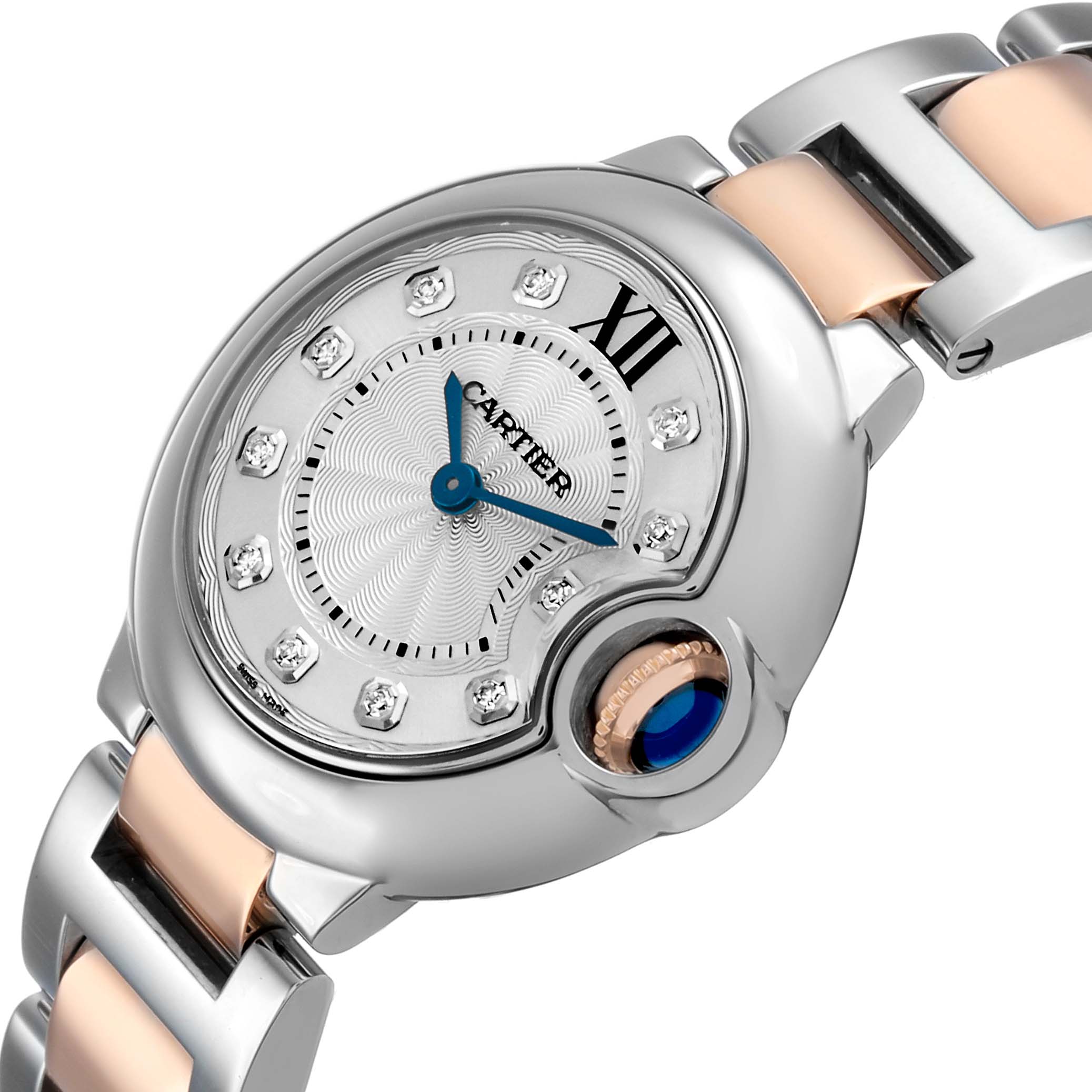 The Cartier Ballon Bleu WE902030 Women's Steel and Gold (two tone) Silver Dial watch is shown at an angle highlighting its face, crown, and part of the strap.