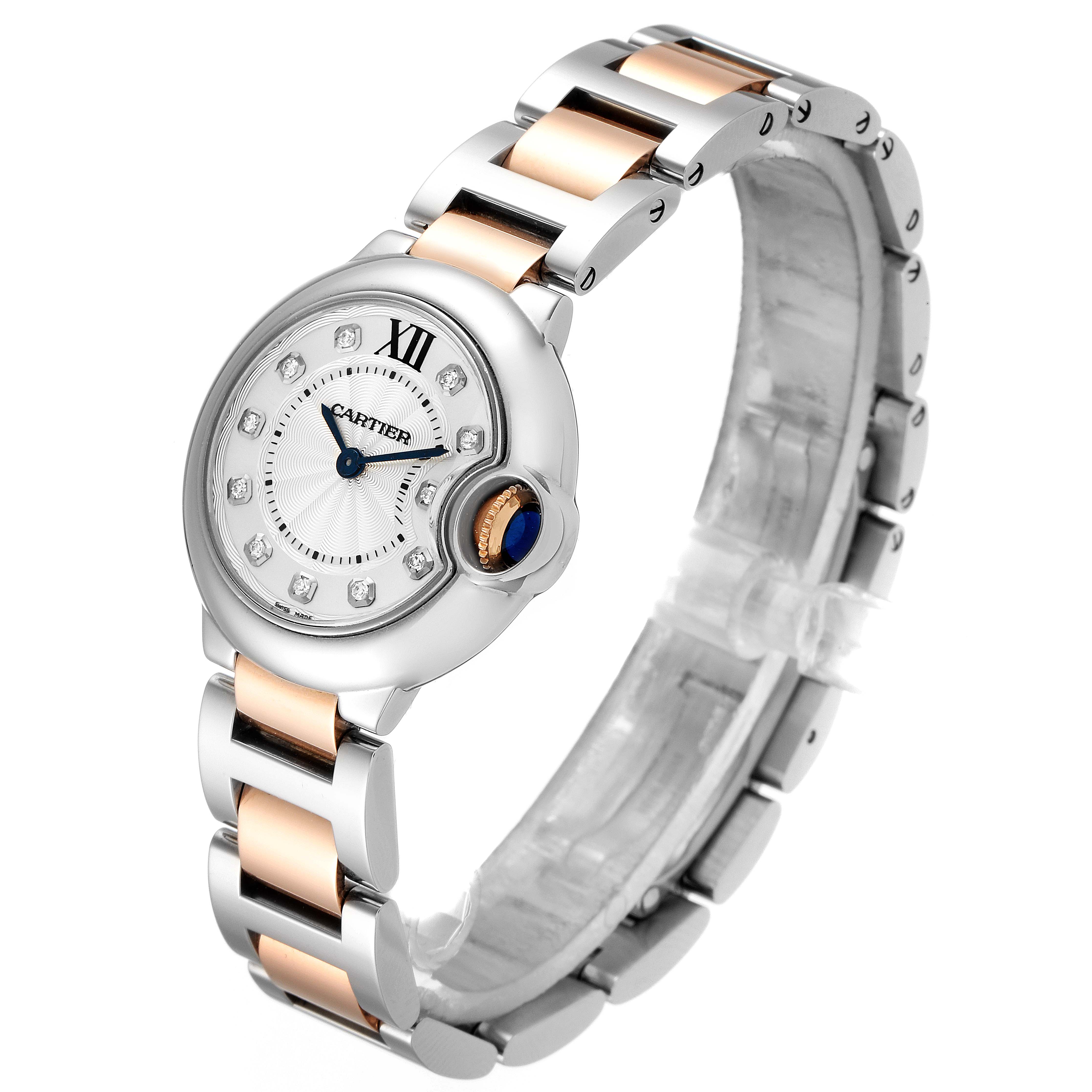 The Cartier Ballon Bleu WE902030 Women's Steel and Gold (two tone) Silver Dial WE902030 Women's Steel and Gold (two tone) Silver Dial watch is shown at an angled view featuring its face, crown, and bracelet.