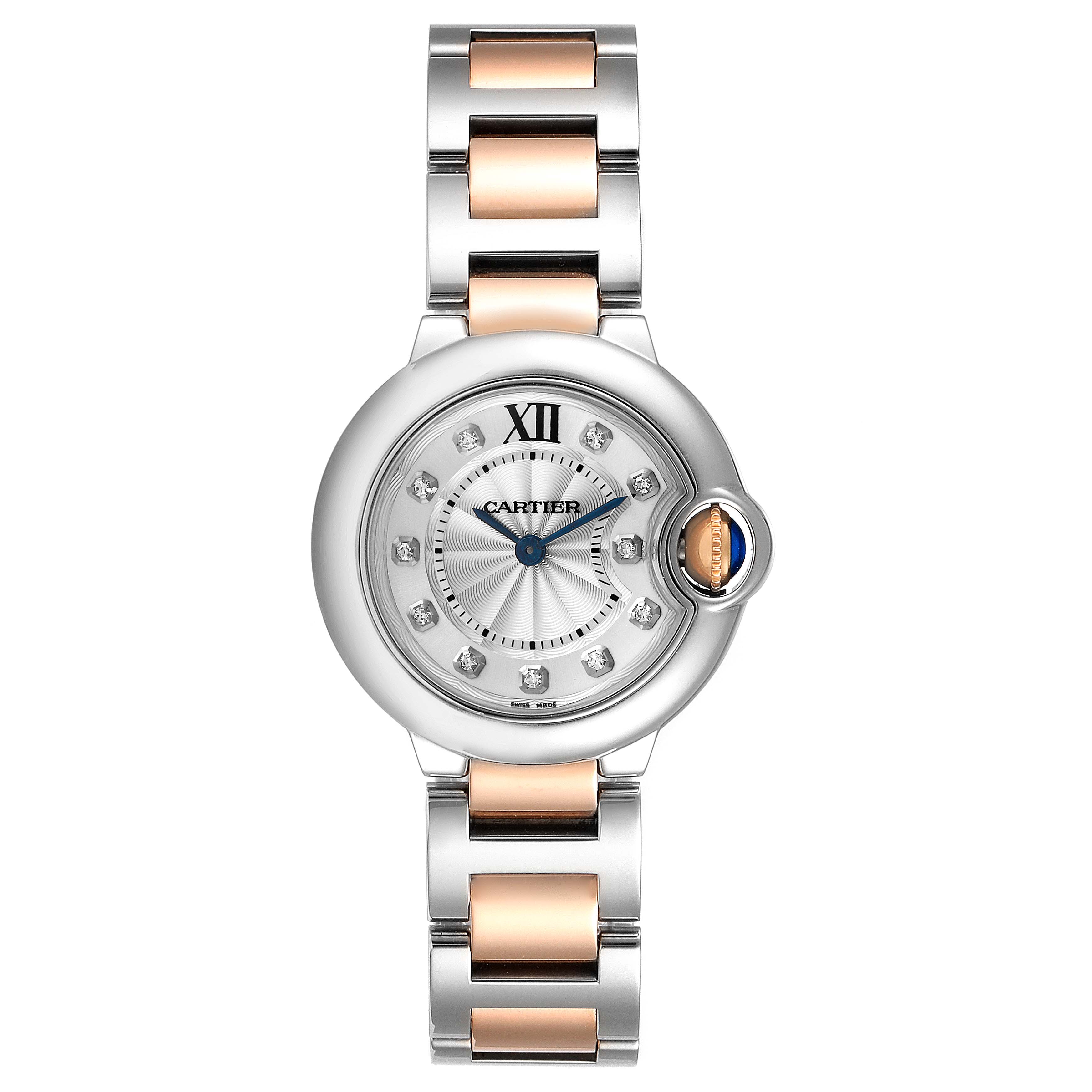 The image shows a Cartier Ballon Bleu WE902030 Women's Steel and Gold (two tone) Silver Dial WE902030 Women's Steel and Gold (two tone) Silver Dial watch front view including the dial, bezel, and two-tone bracelet.