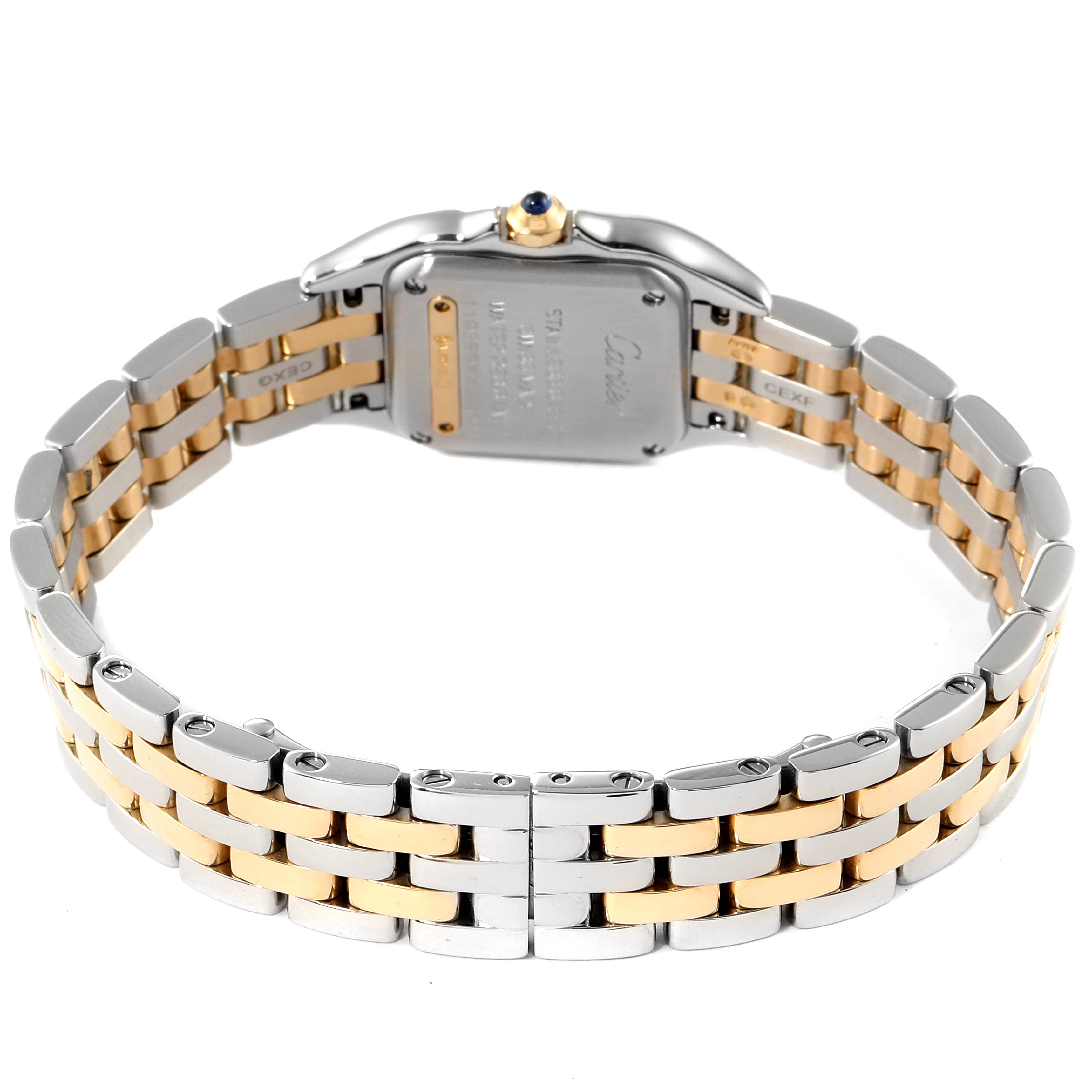 The image shows the backside of the Panthère de Cartier watch, highlighting its two-tone metal bracelet and case back.