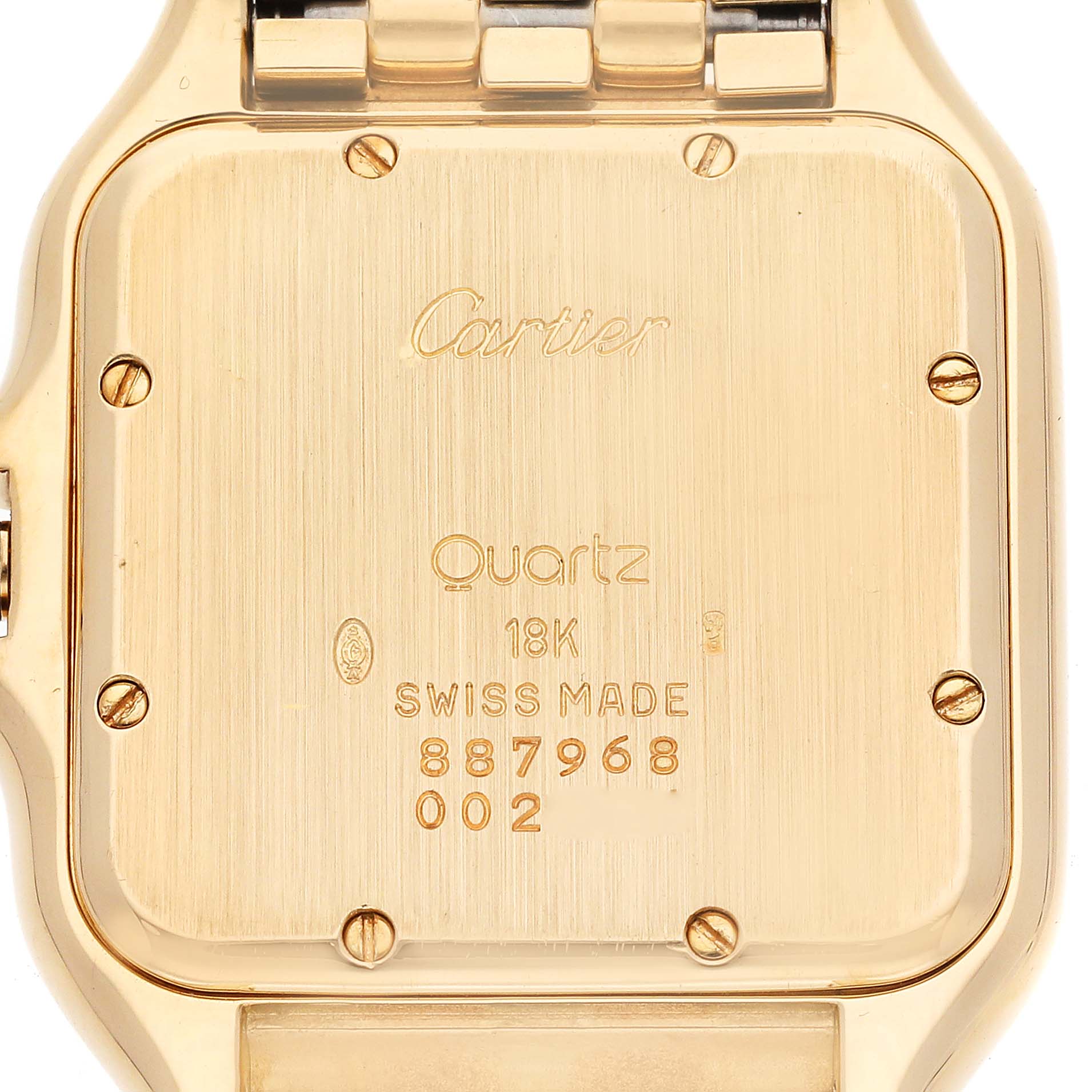 The image shows the back case of a Panthere model Cartier watch, displaying engravings and screws.