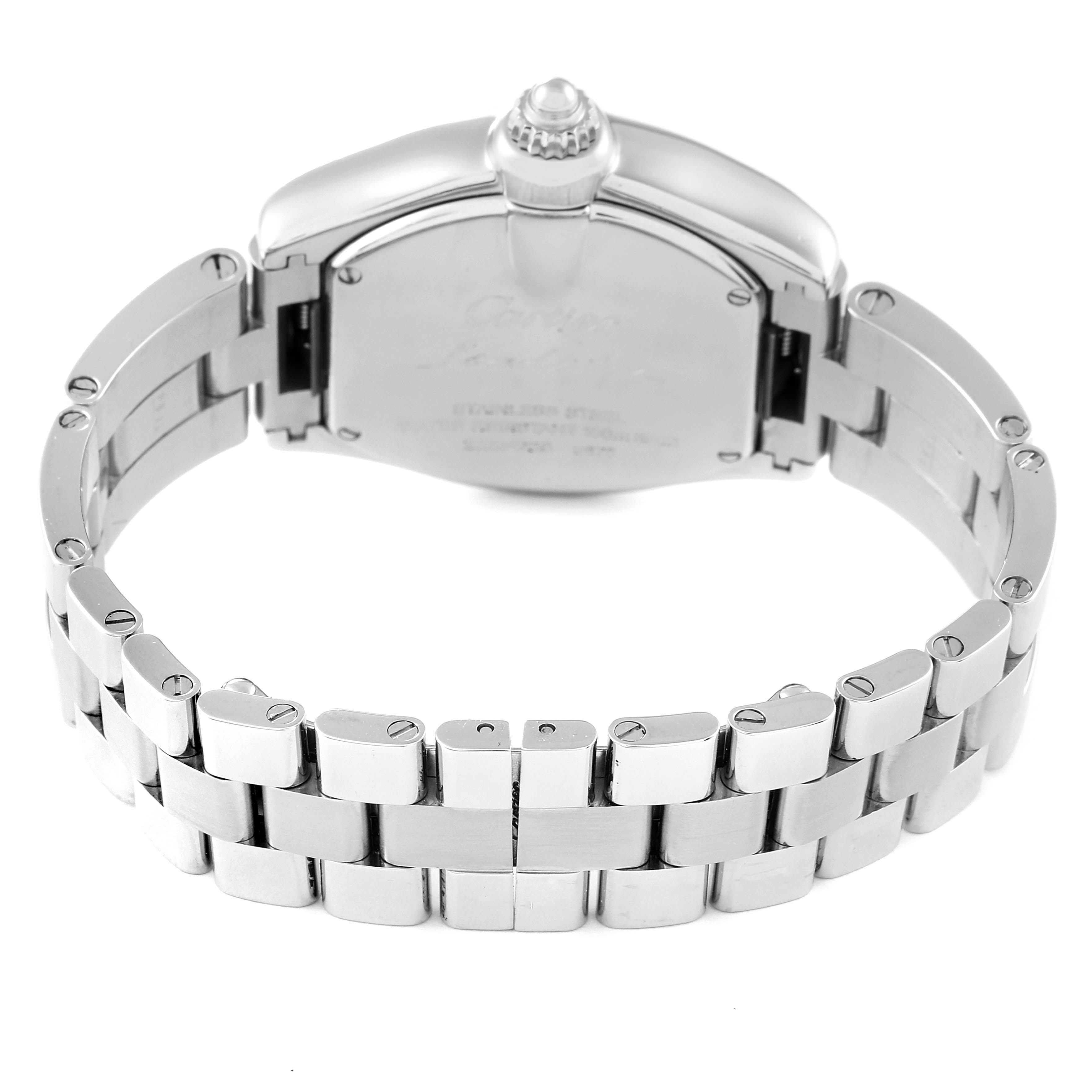 The image shows the back view of a Cartier Roadster W62017V3 Women's Stainless Steel Pink Dial W62017V3 Women's Stainless Steel Pink Dial watch and its metal bracelet.