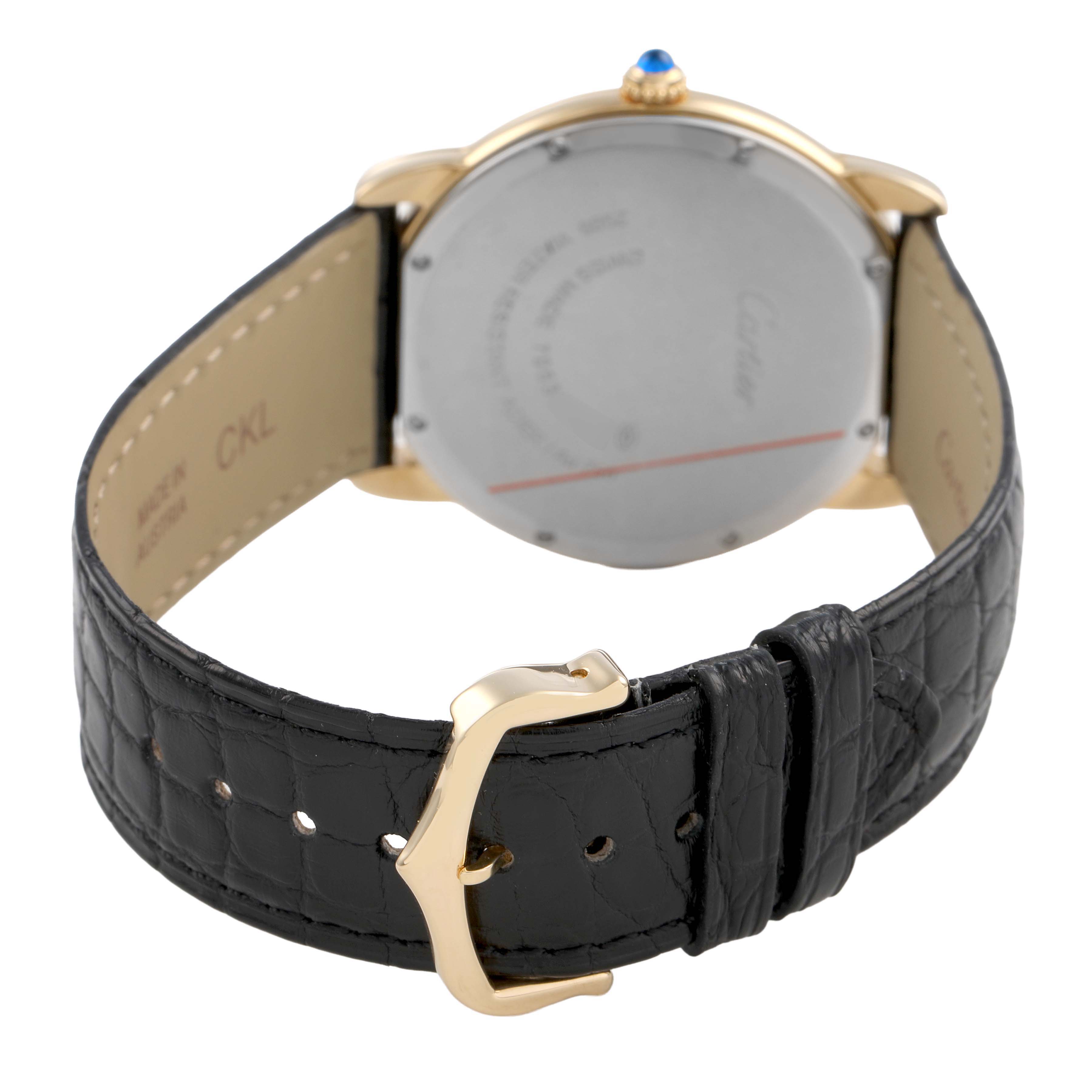 The Cartier Ronde W6700455 Men's Yellow Gold Silver Dial watch is shown from the back, highlighting the case back, strap, and buckle.