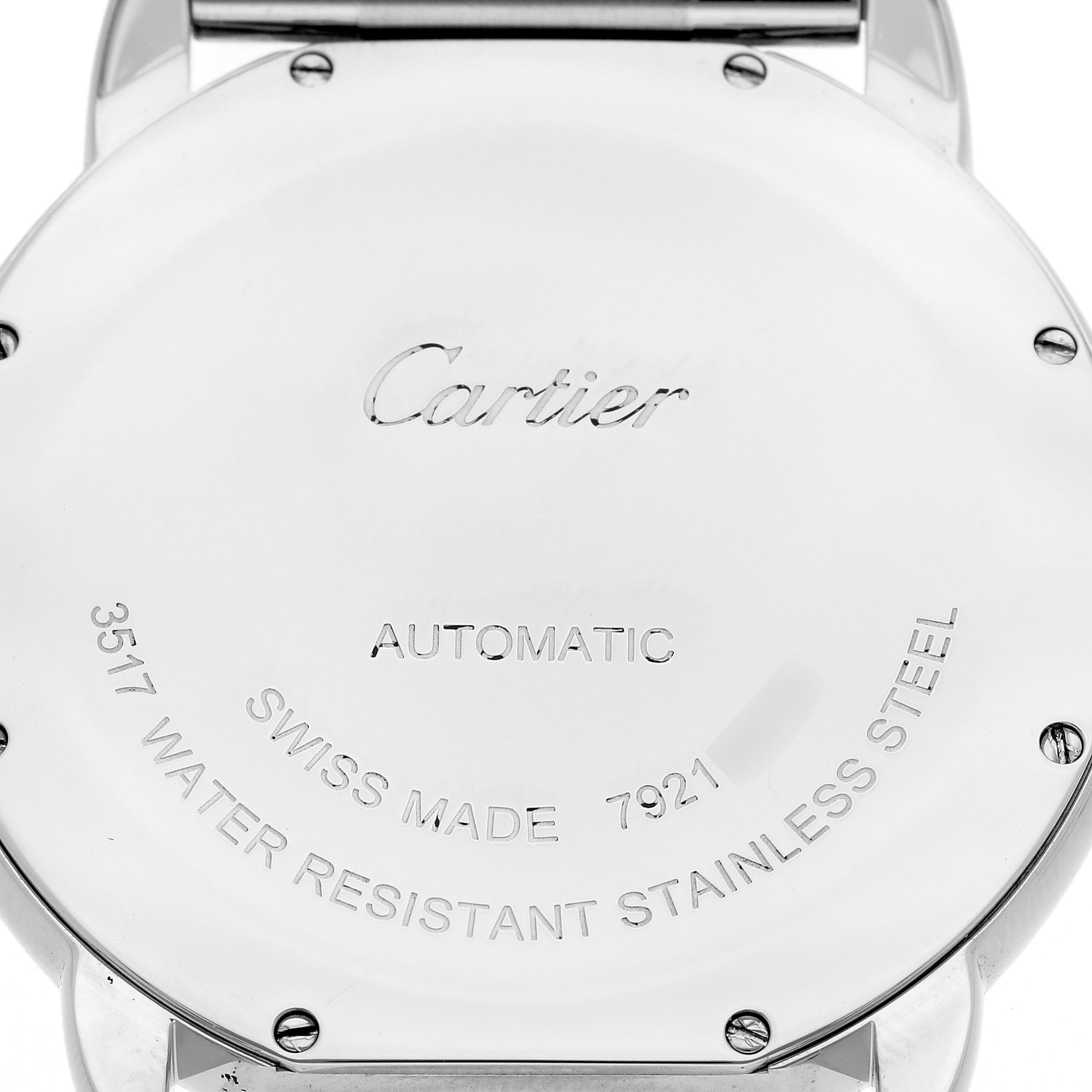 The image shows the back case of the Cartier Ronde W6701011 Men
s Stainless Steel Silver Dial W6701011 Men
s Stainless Steel Silver Dial watch, featuring engraved specifications such as "Automatic" and "Swiss Made."