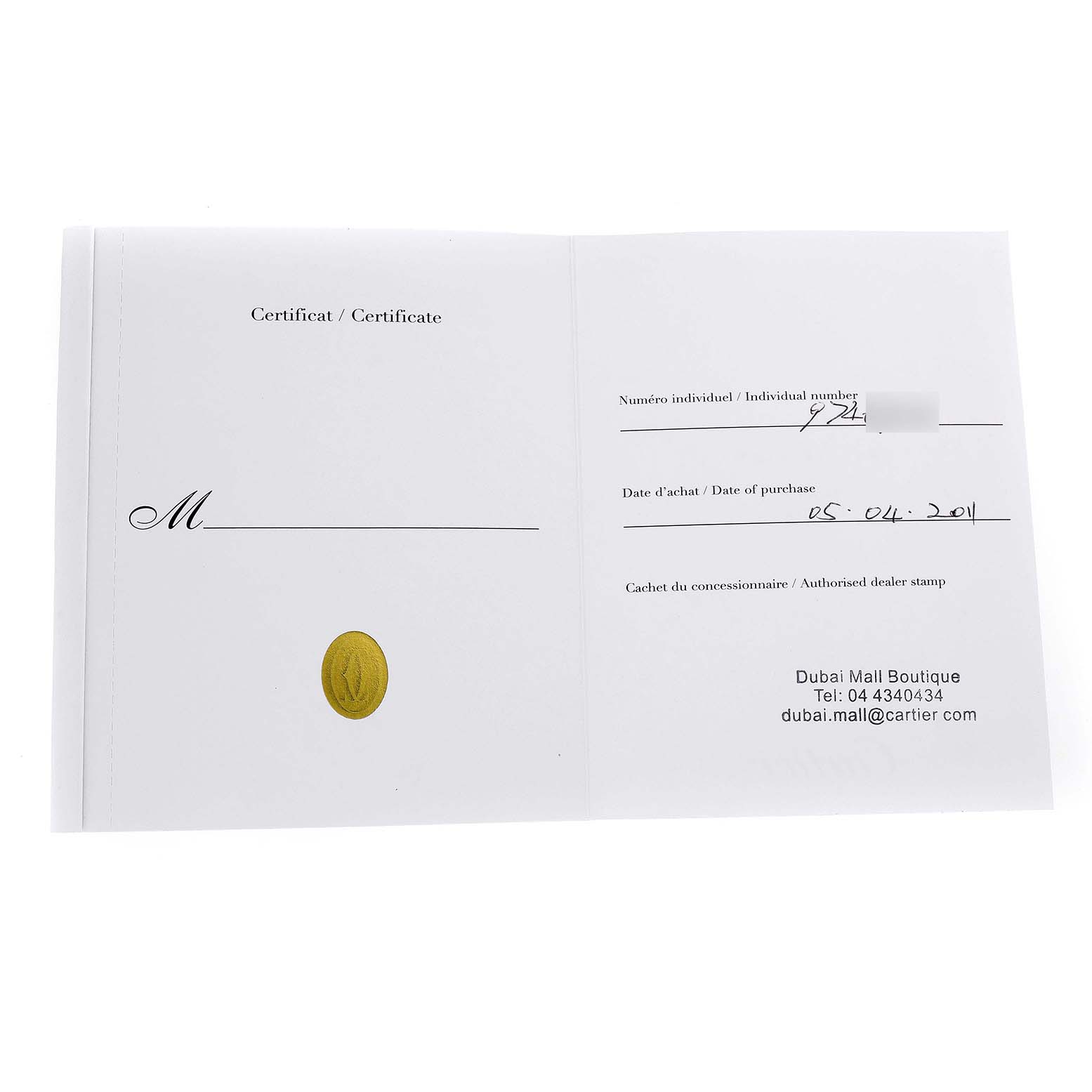 The image shows the warranty certificate for the Cartier Tank Louis W1560002 Men's Rose Gold Brown Dial watch.