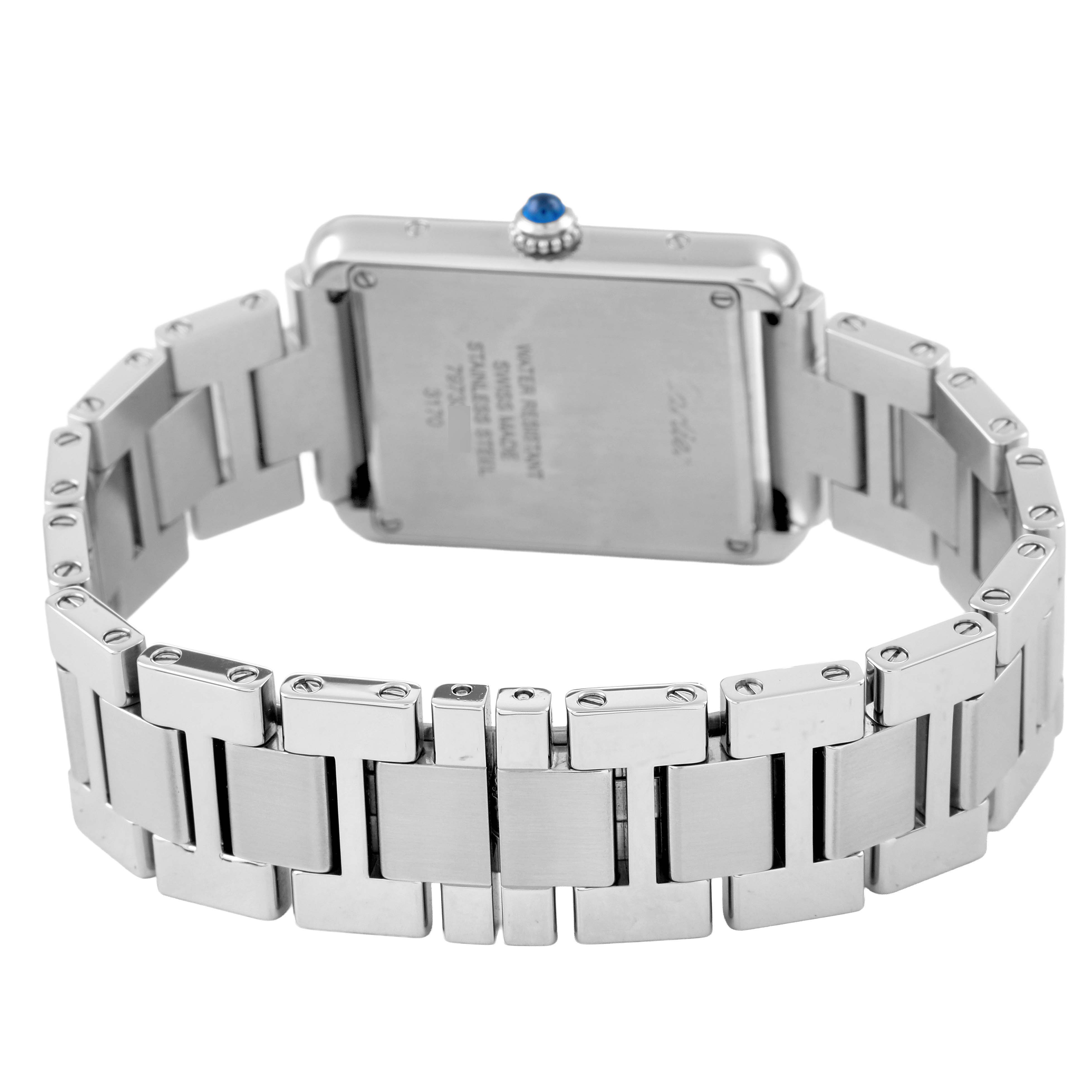 The image shows the back of the Cartier Tank Solo W5200013 Women's Stainless Steel Silver Dial watch, including the metal bracelet and part of the case with the crown.