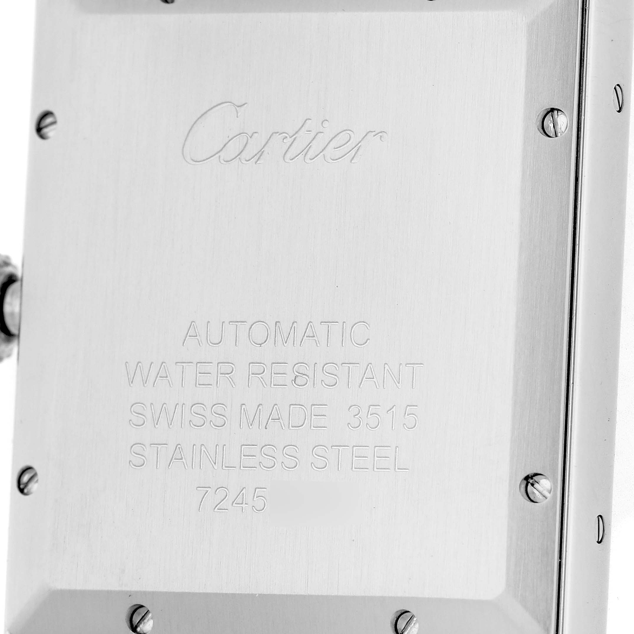 The image shows the back case of a Cartier Tank Solo W5200028 Men's Stainless Steel Silver Dial watch, displaying brand engravings and specifications.
