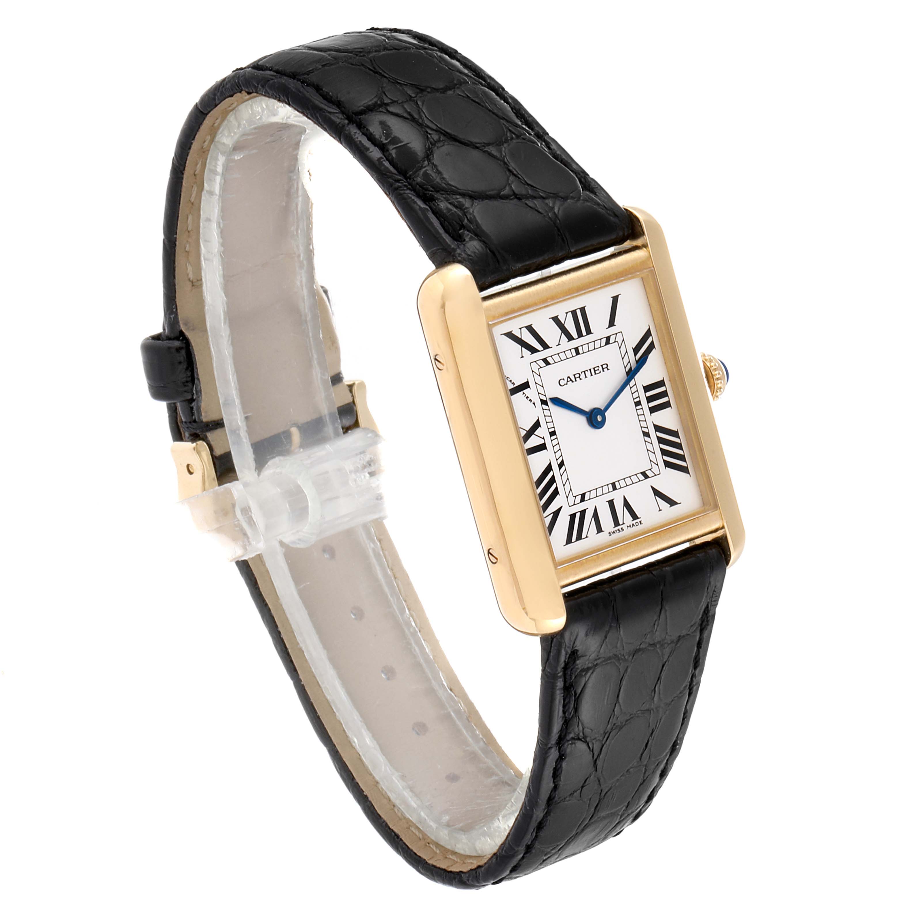 The image shows a Cartier Tank Solo W1018755 Women
s Yellow Gold Silver Dial W1018755 Women
s Yellow Gold Silver Dial watch at a three-quarter angle, featuring its black leather strap and rectangular gold case.
