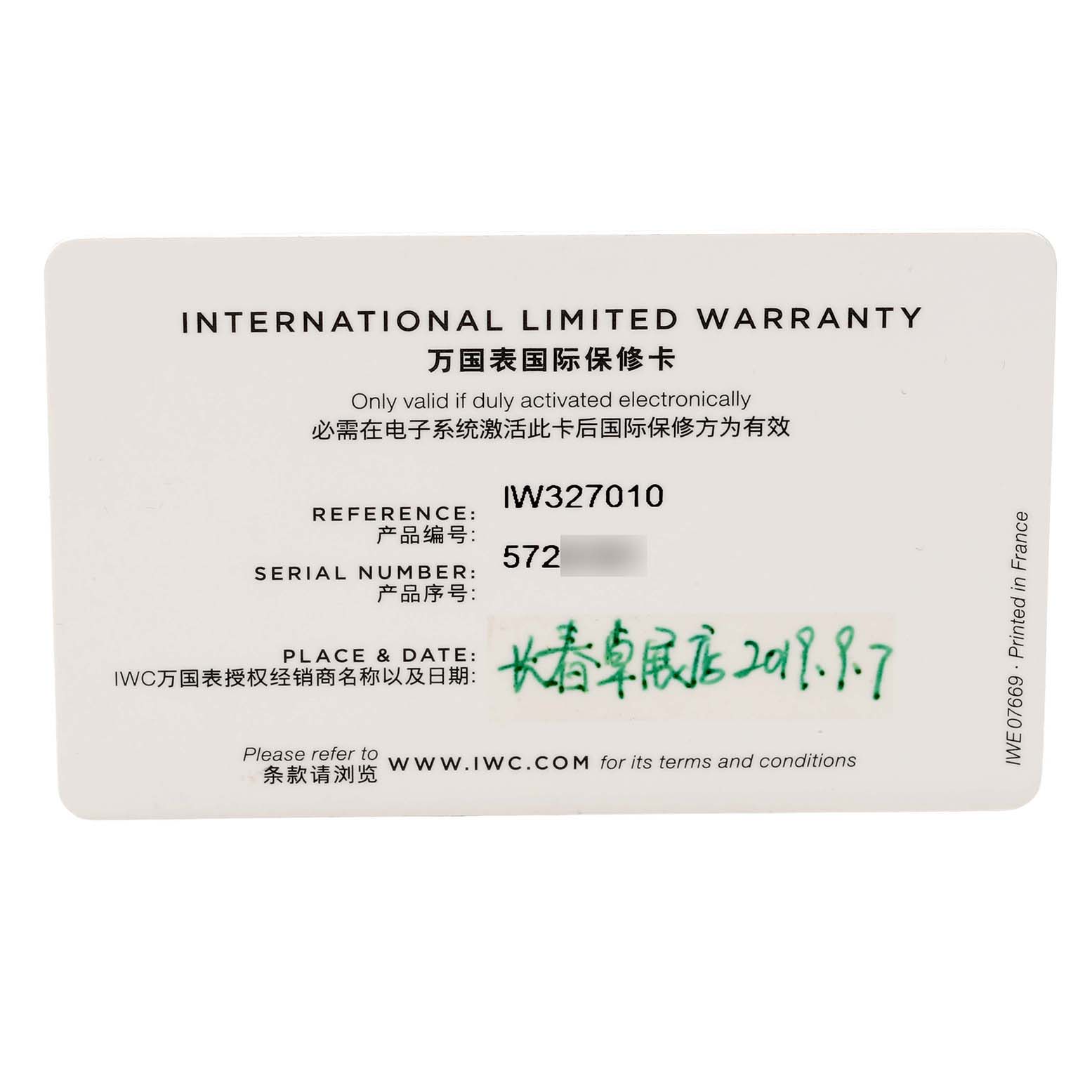 The image shows an IWC Pilot IW327010 Men's Stainless Steel Blue Dial model warranty card displaying reference and serial numbers.