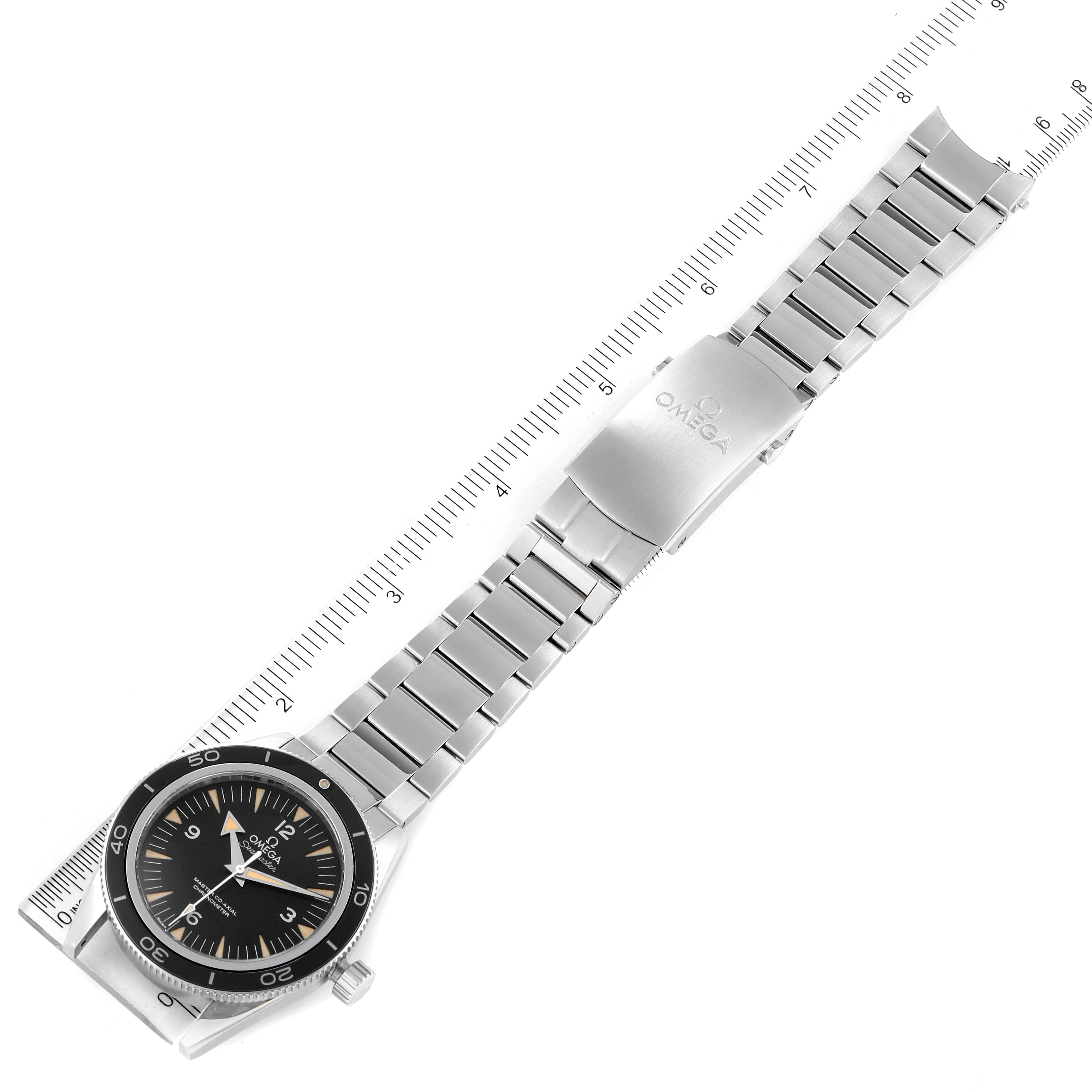 The image shows an Omega Seamaster 233.30.41.21.01.001 Men's Stainless Steel Black Dial 233.30.41.21.01.001 Men's Stainless Steel Black Dial watch laid flat with its bracelet and clasp visible, measured against a ruler.