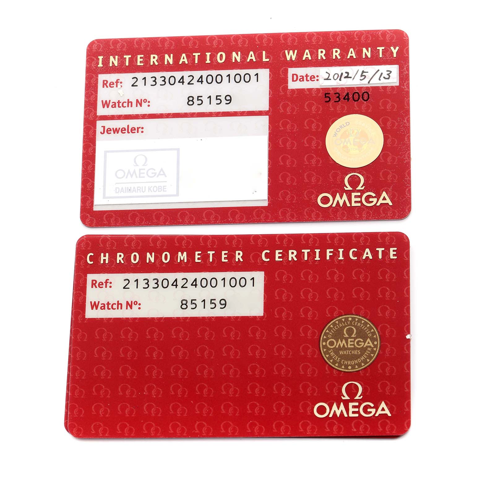 The image shows the International Warranty and Chronometer Certificate cards for an Omega Seamaster 213.30.42.40.01.001 Men's Stainless Steel Black Dial 213.30.42.40.01.001 Men's Stainless Steel Black Dial watch.