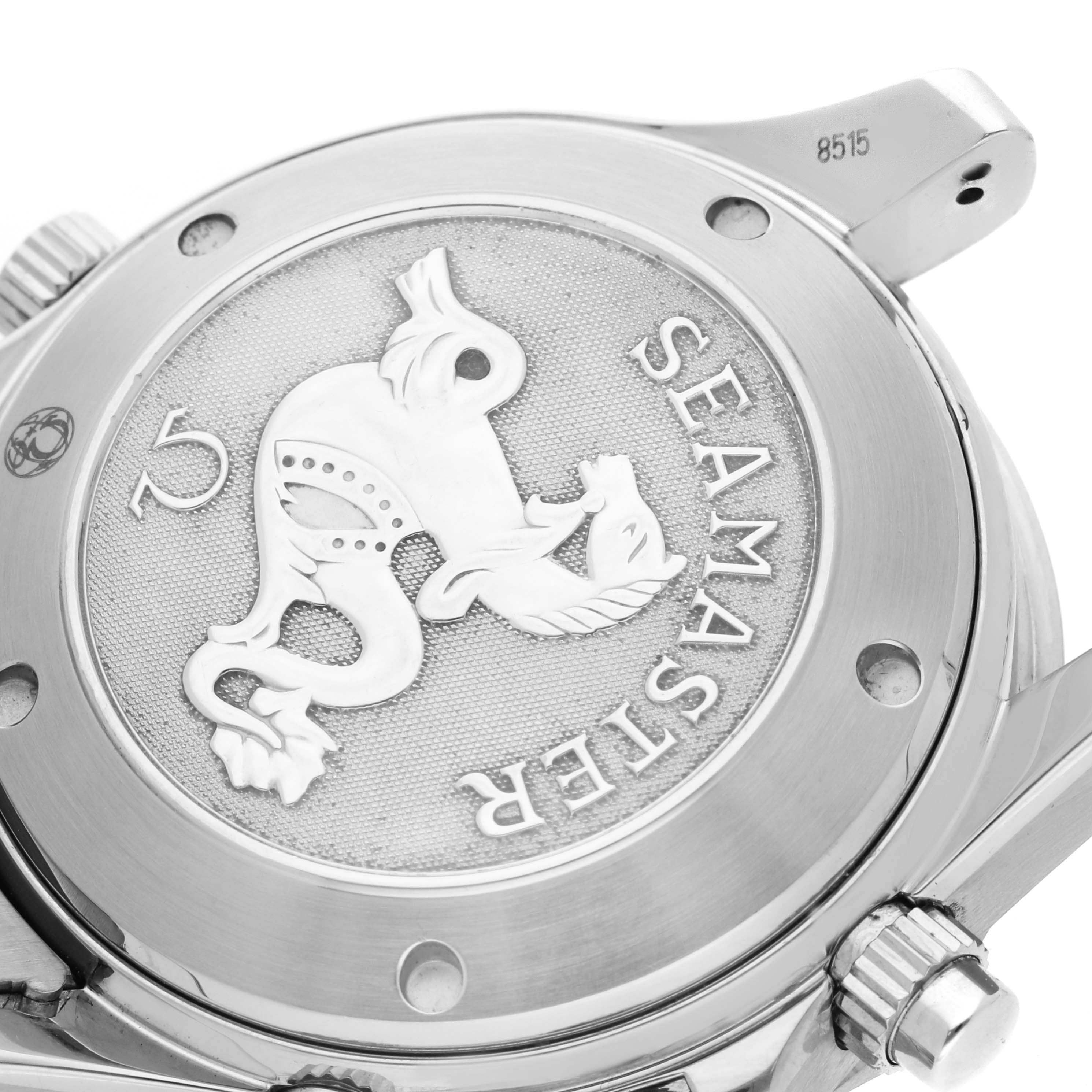 The image shows the back case of an Omega Seamaster 213.30.42.40.01.001 Men's Stainless Steel Black Dial 213.30.42.40.01.001 Men's Stainless Steel Black Dial watch, highlighting its emblem and engravings from a close angle.