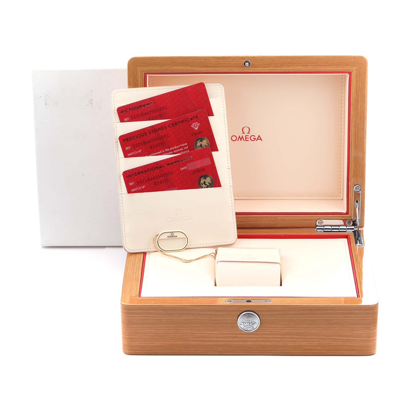 The image shows the open box of an Omega Planet Ocean 222.18.46.20.01.001 Men's Stainless Steel Black Dial 222.18.46.20.01.001 Men's Stainless Steel Black Dial watch, featuring warranty cards and a pouch inside.