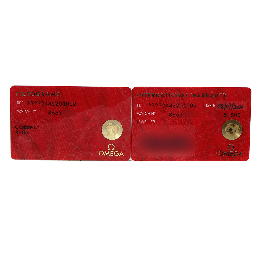 The image shows two red Omega warranty cards for the Planet Ocean model with reference and watch numbers.