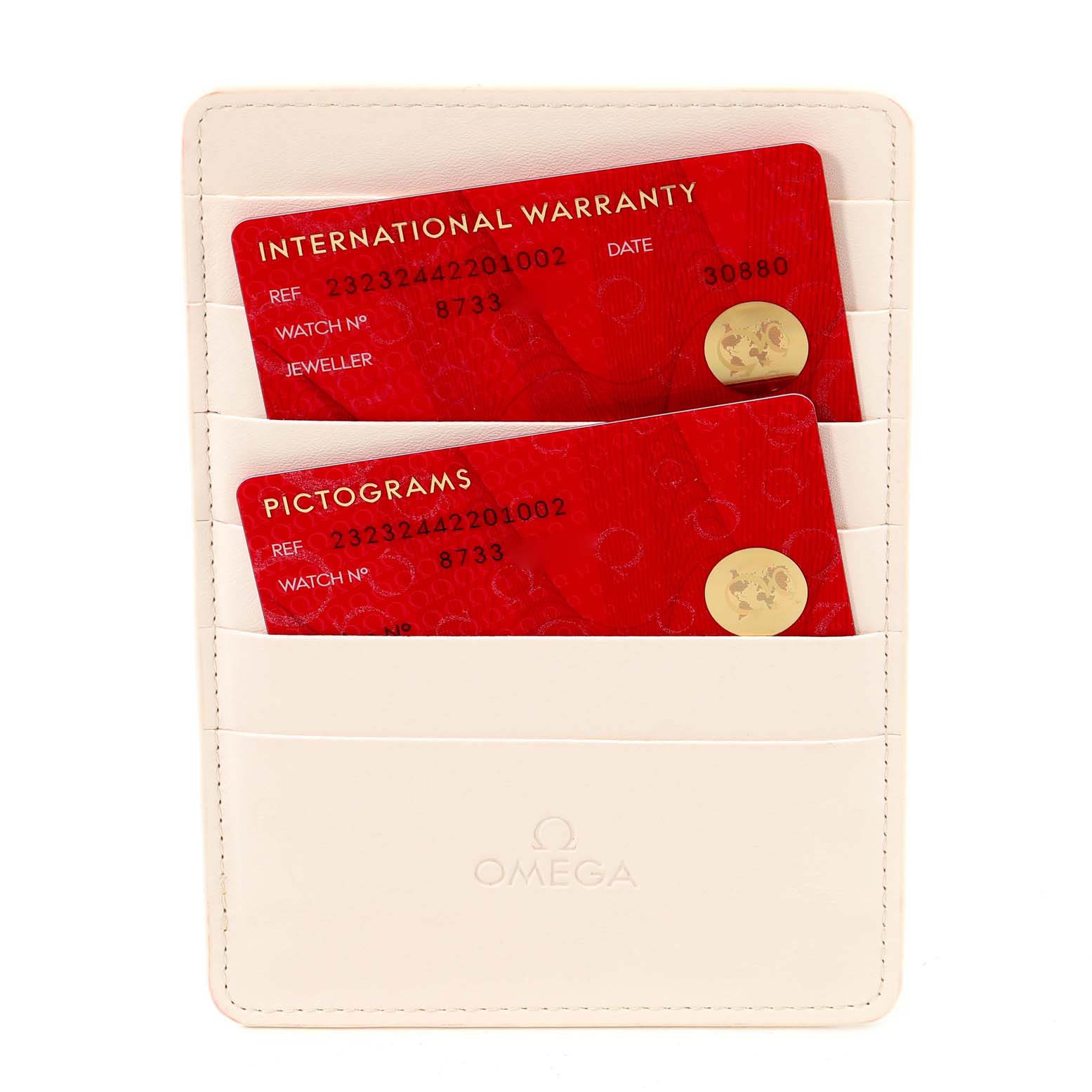 The image shows two red cards, International Warranty and Pictograms, inside a white Omega cardholder for the Omega Planet Ocean 232.32.44.22.01.002 Men
s Stainless Steel Black Dial 232.32.44.22.01.002 Men
s Stainless Steel Black Dial model watch.