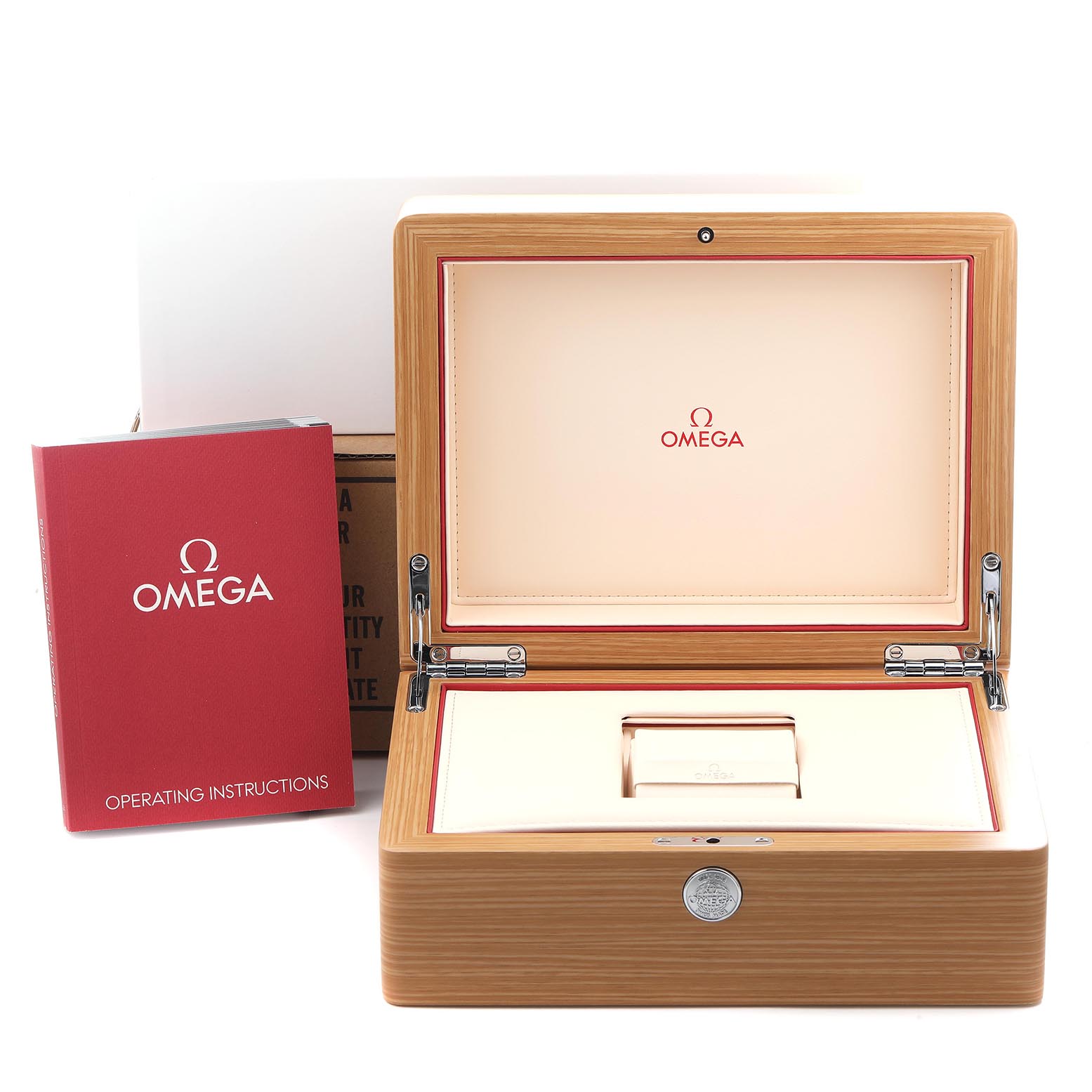 The image shows the open wooden box and operating instructions for the Omega Planet Ocean 232.32.44.22.03.001 Men's Stainless Steel Blue Dial 232.32.44.22.03.001 Men's Stainless Steel Blue Dial watch, highlighting its packaging.