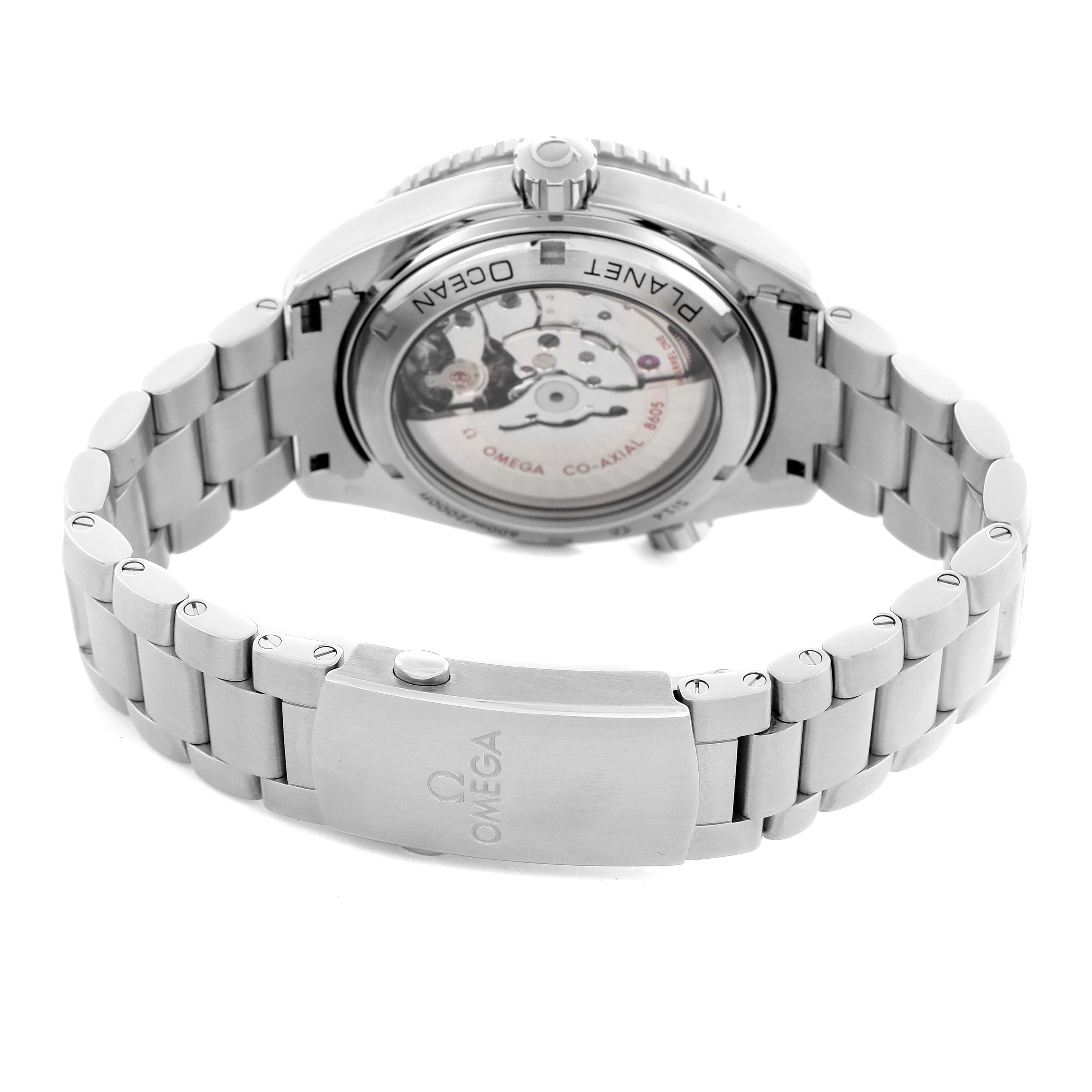 The Omega Planet Ocean 232.30.44.22.01.001 Men
s Stainless Steel Black Dial 232.30.44.22.01.001 Men
s Stainless Steel Black Dial watch is shown from the back, highlighting its transparent case back and bracelet clasp.