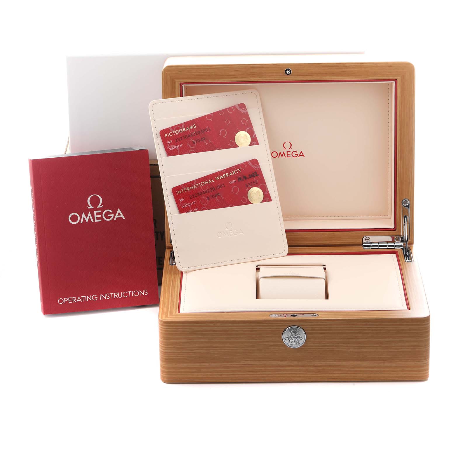 The image shows the Omega Planet Ocean 232.30.44.22.01.001 Men
s Stainless Steel Black Dial 232.30.44.22.01.001 Men
s Stainless Steel Black Dial watch box, warranty cards, and operating instructions from a frontal angle.