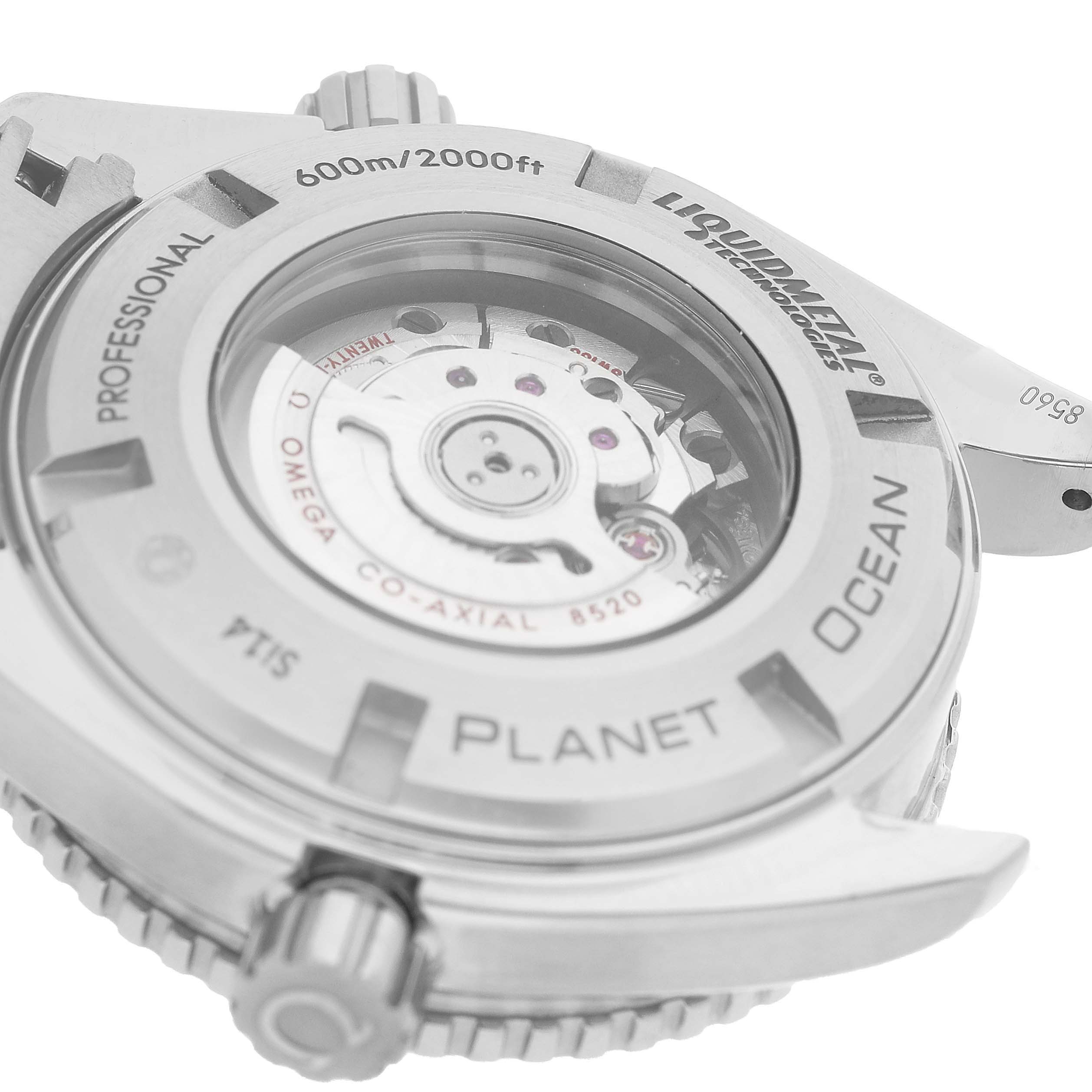 The image shows the back case of an Omega Planet Ocean 232.90.38.20.03.001 Men's Titanium Blue Dial watch, highlighting its co-axial movement and transparent caseback.