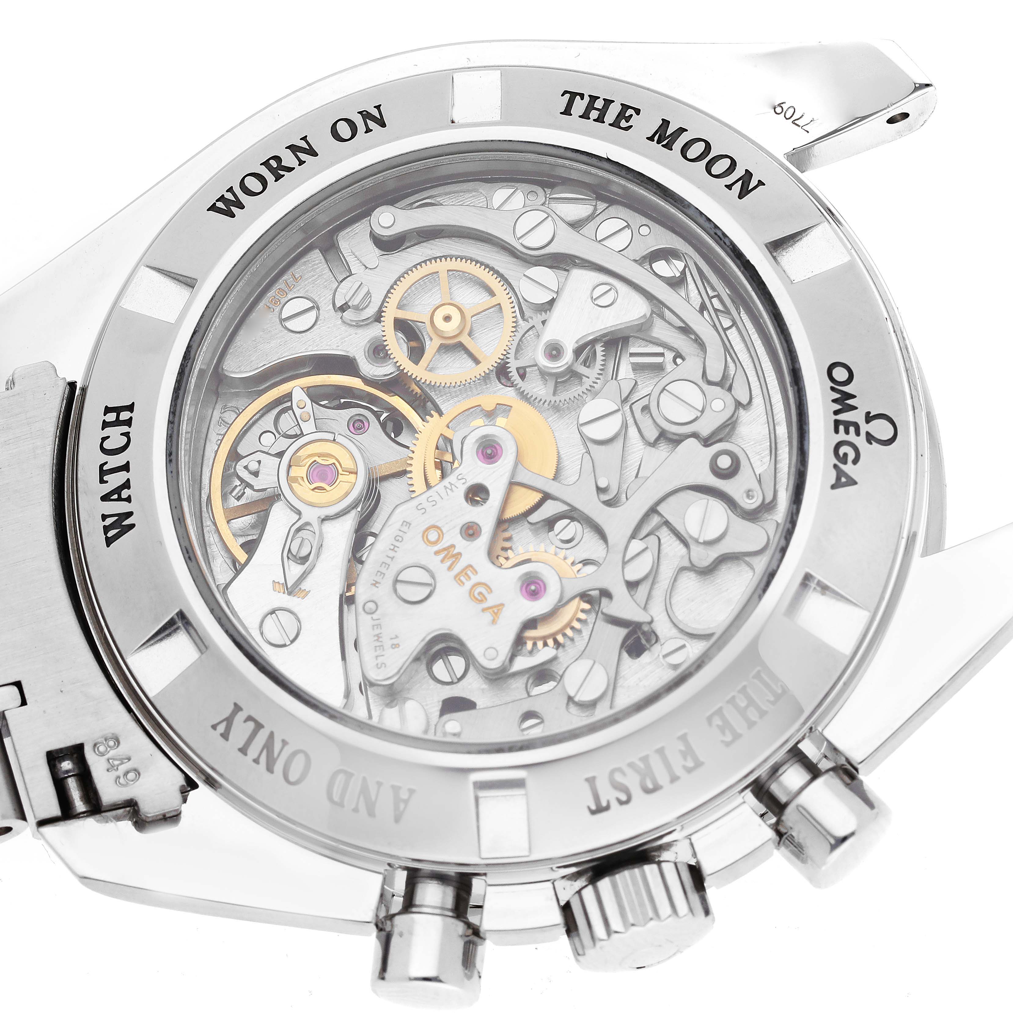 This image shows the back view of an Omega Speedmaster 3573.50.00 Men
s Stainless Steel Black Dial 3573.50.00 Men
s Stainless Steel Black Dial, highlighting its intricate inner mechanics and branding.