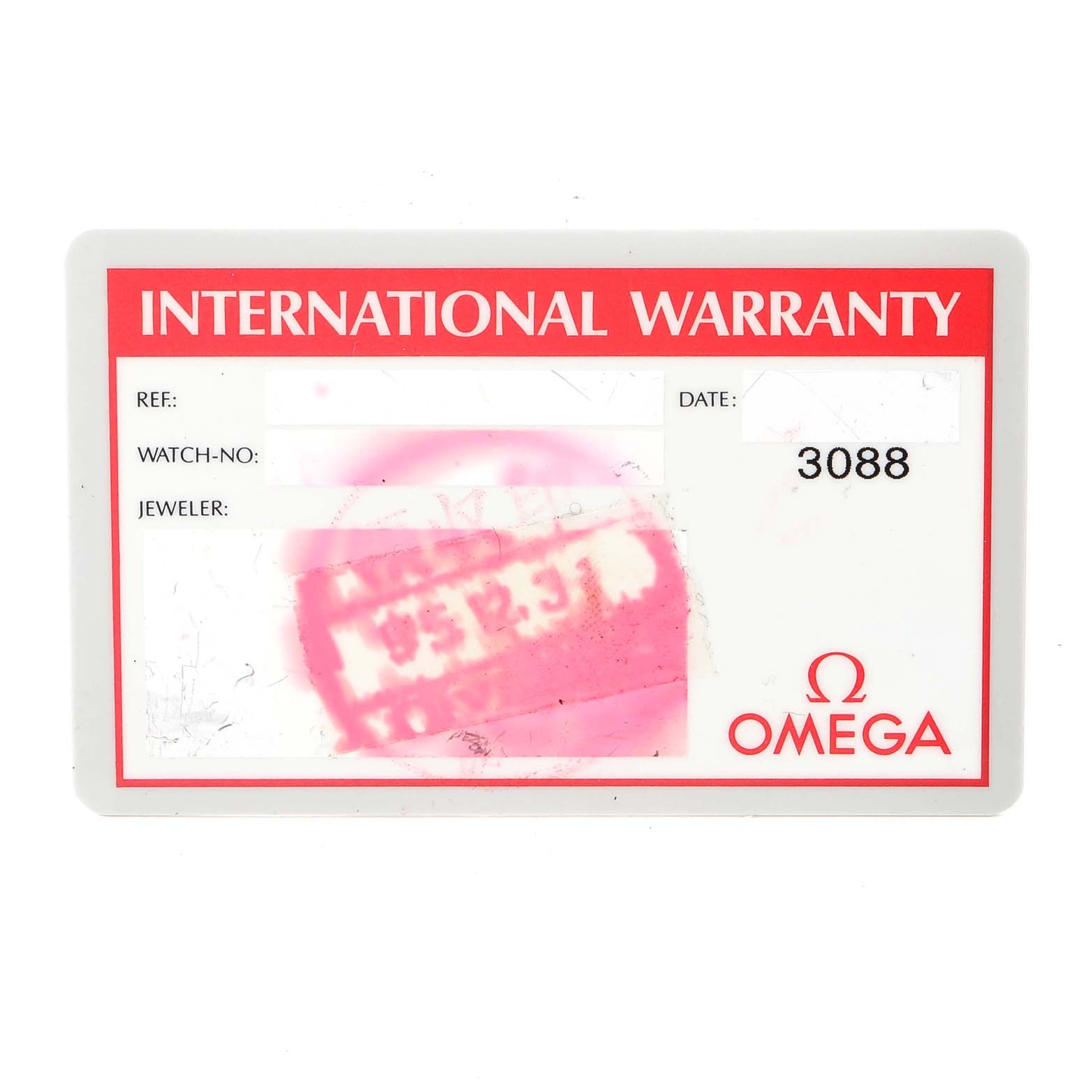 The image shows an international warranty card for an Omega Speedmaster 3310.10.00 Men
s Steel and Gold (two tone) Champagne Dial 3310.10.00 Men
s Steel and Gold (two tone) Champagne Dial watch, with various fields for reference, date, watch number, and jeweler information.