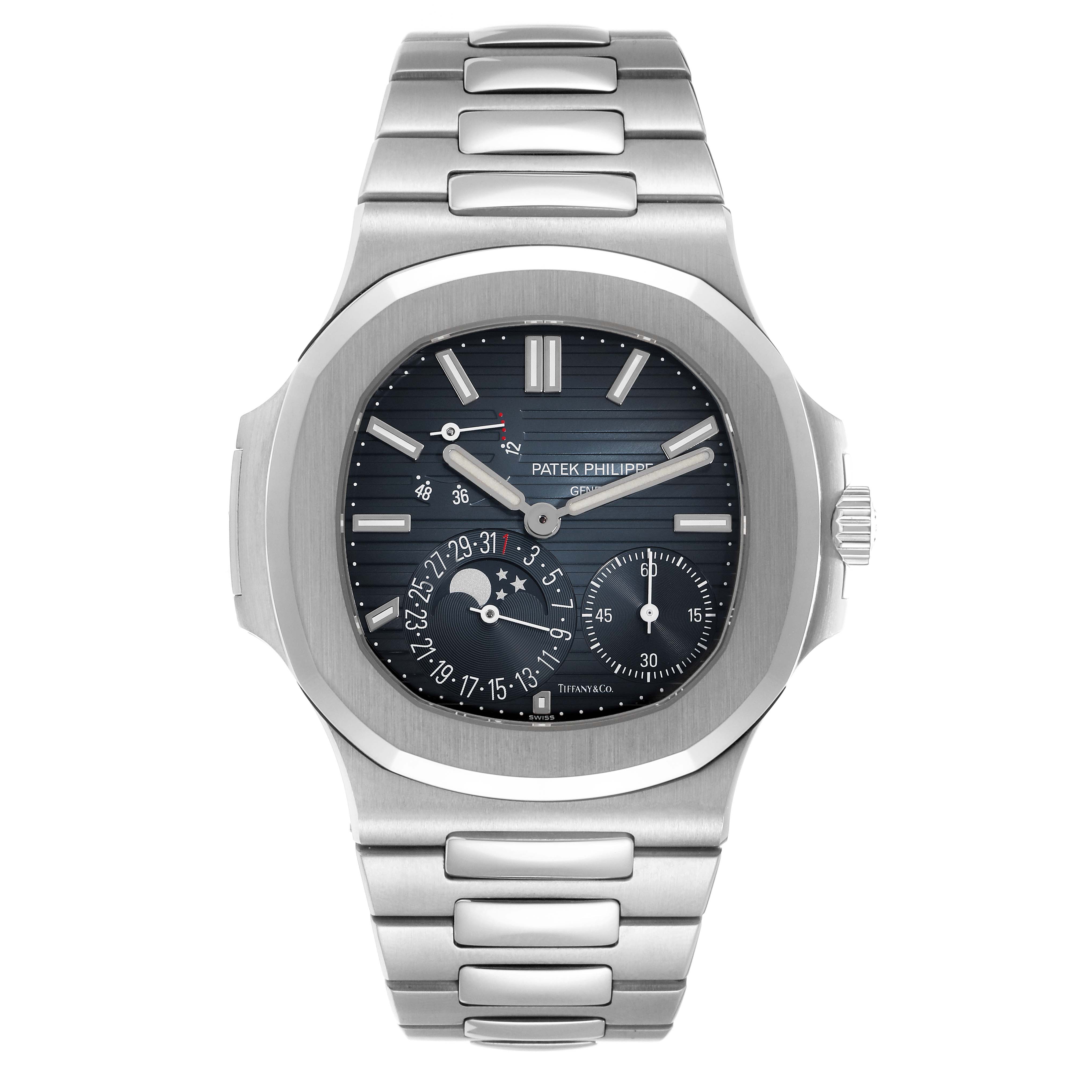 The Patek Philippe Nautilus 5712/1A-001 Men's Stainless Steel Blue Dial watch is shown from a top-down angle, displaying its dial, bracelet, and features such as sub-dials.