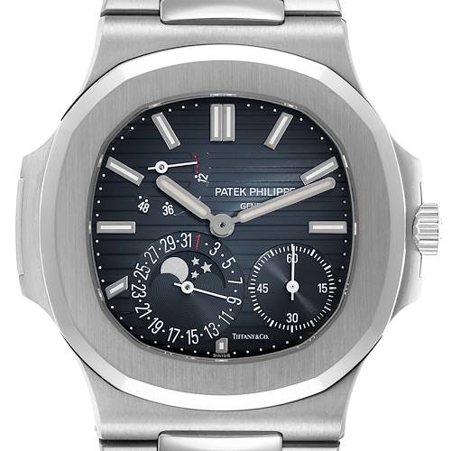The Patek Philippe Nautilus 5712/1A-001 Men's Stainless Steel Blue Dial watch is shown from the front, displaying the dial, hands, moon phase, and date indicators.