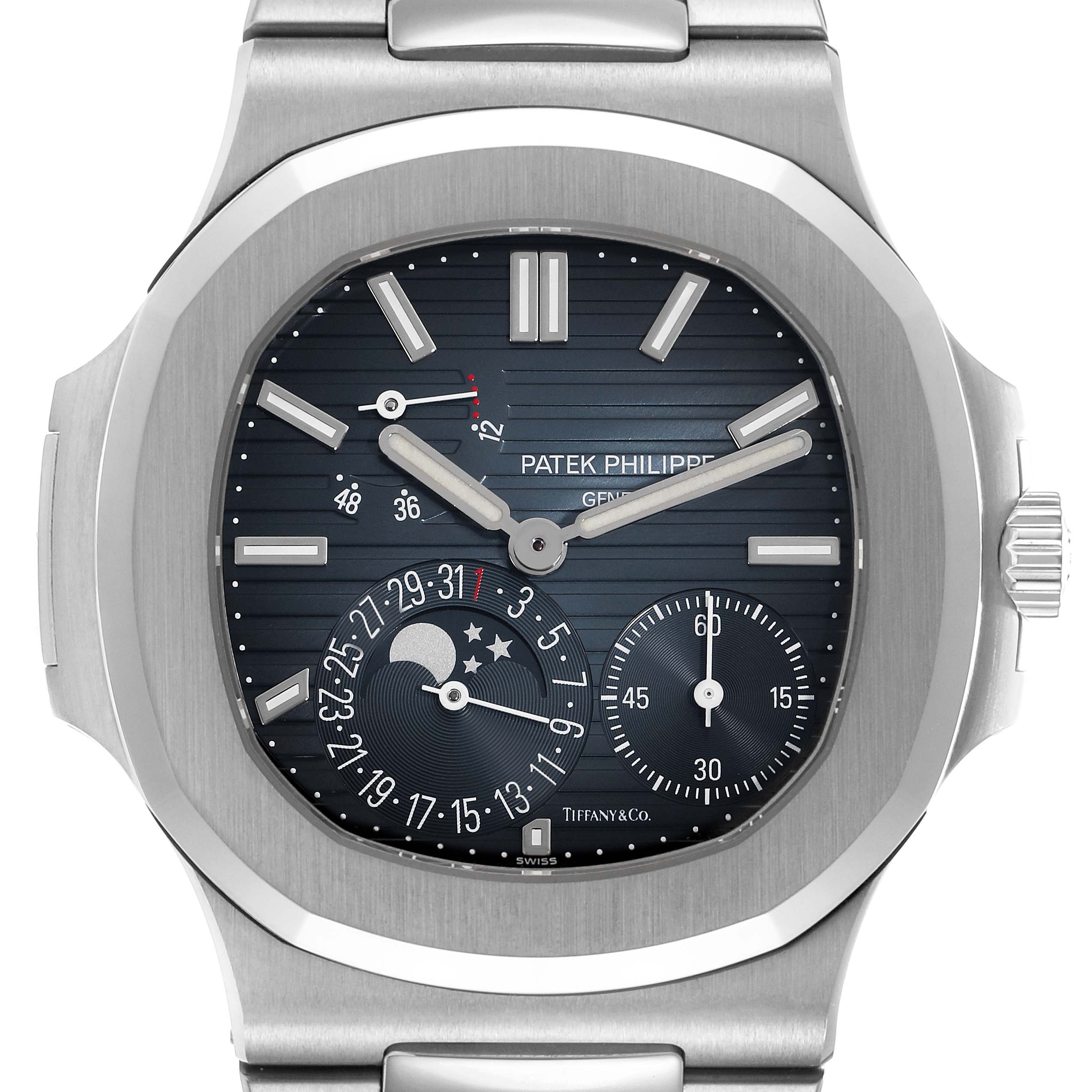 The image shows a front view of the Patek Philippe Nautilus 5712/1A-001 Men's Stainless Steel Blue Dial watch, highlighting the dial, indices, hands, and subdials.