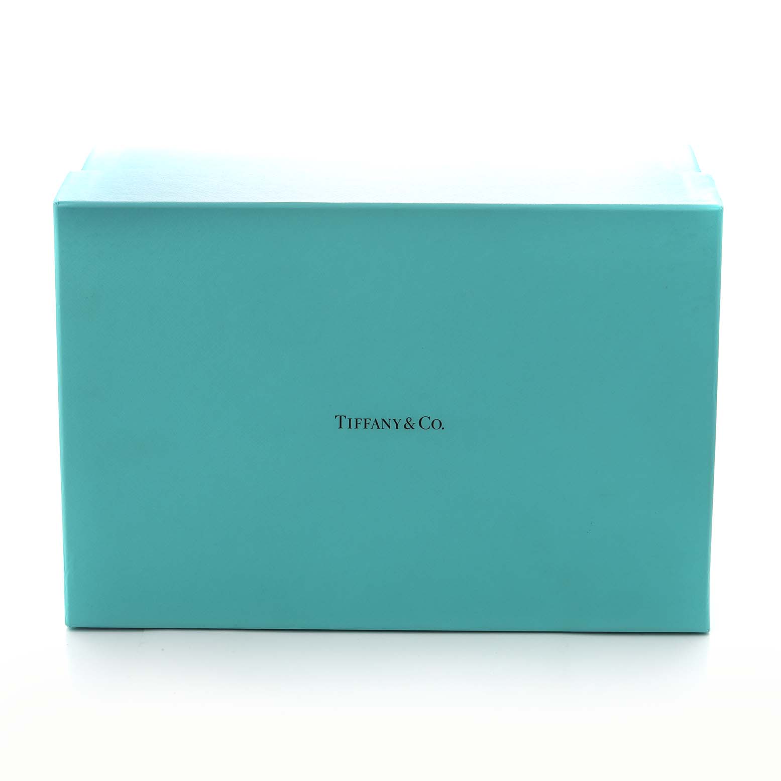 The image shows a Tiffany & Co. box, likely for a Patek Philippe Nautilus 5712/1A-001 Men's Stainless Steel Blue Dial watch or accessory.