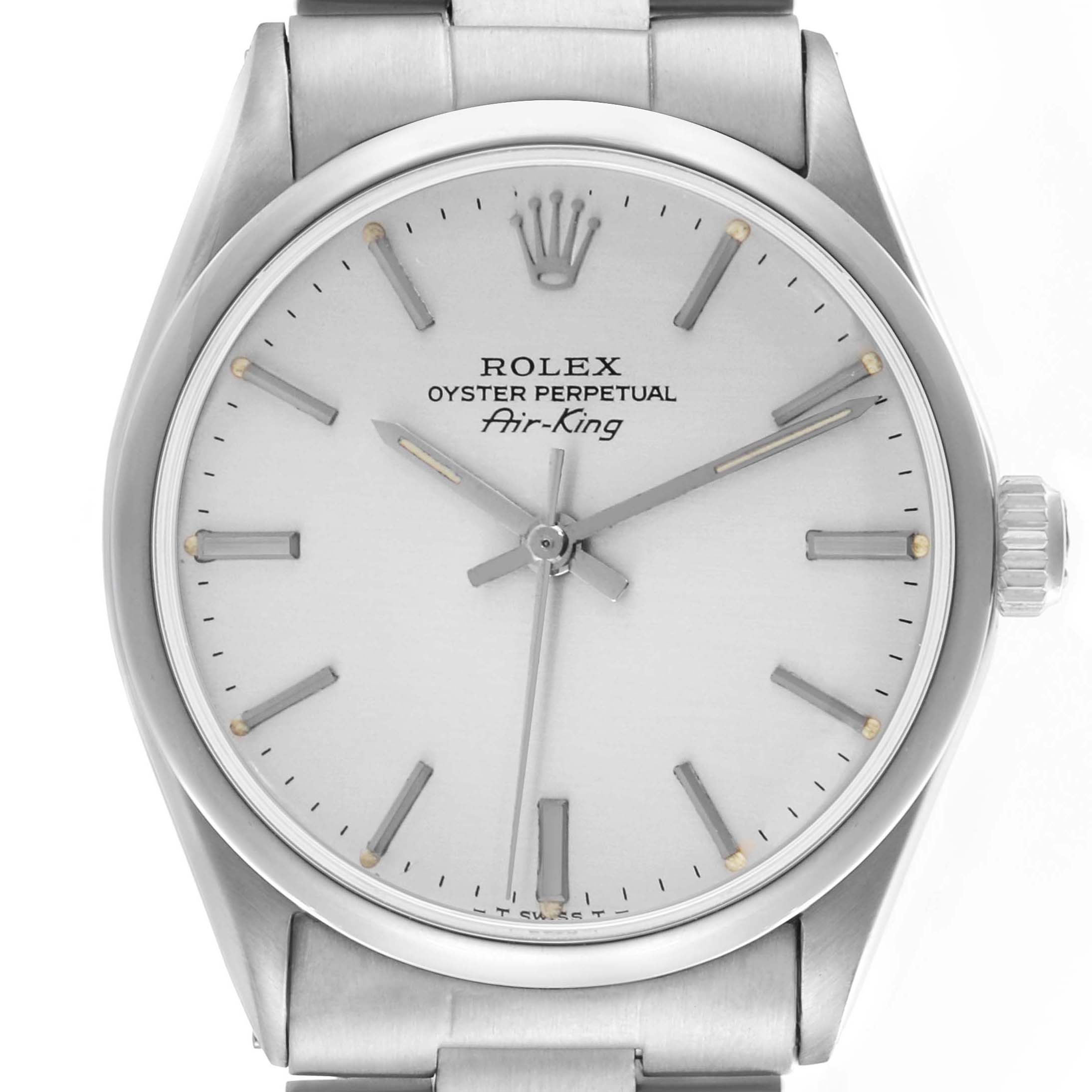 The Rolex Air-King watch is shown from the front, focusing on the dial, bezel, and part of the bracelet.