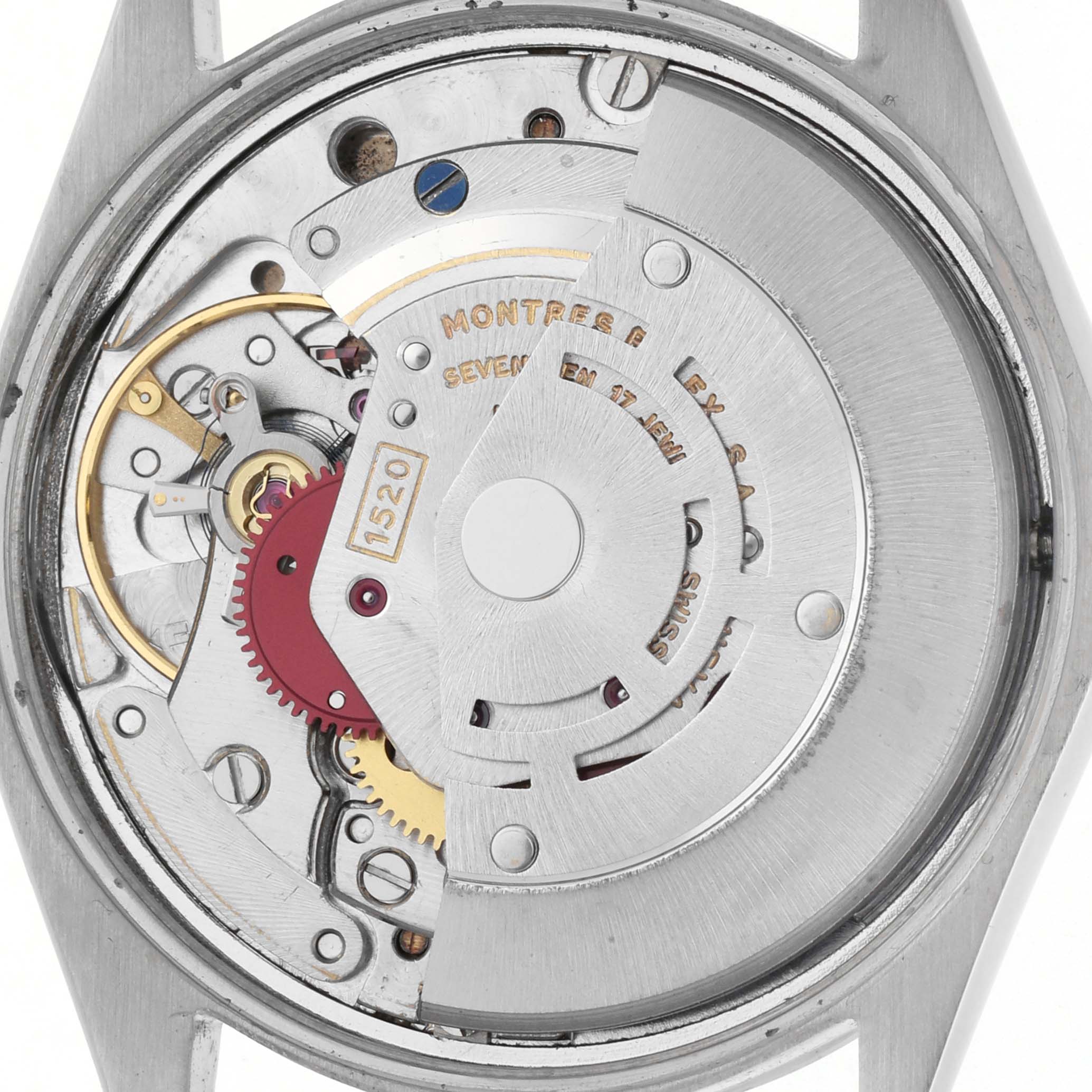 The image shows the back view of the Rolex Air-King, focusing on its exposed movement mechanism.