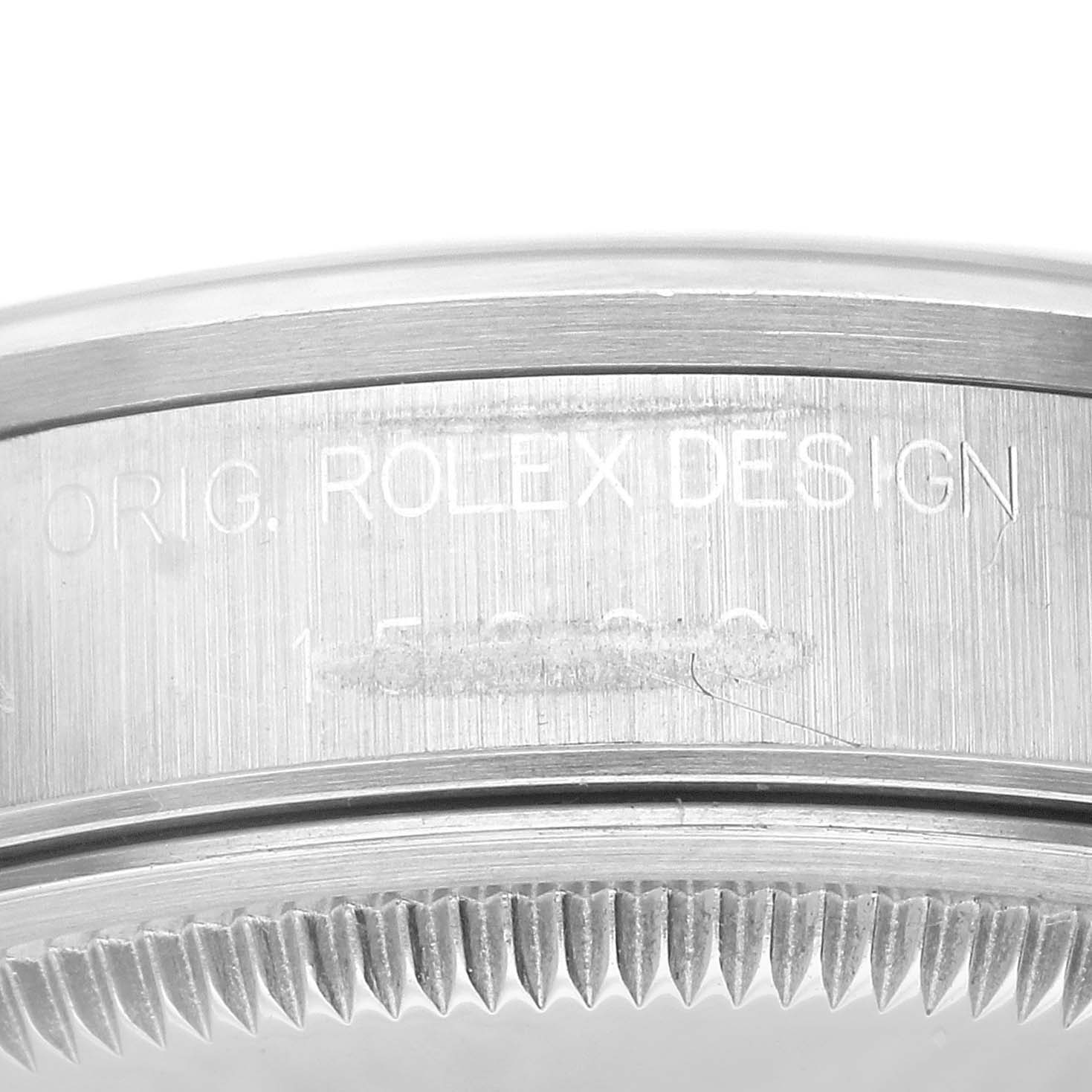 The image shows a close-up of the case side and bezel of a Rolex Date 15200 Men's Stainless Steel Blue Dial 15200 Men's Stainless Steel Blue Dial model, displaying the "ORIG. ROLEX DESIGN" engraving.
