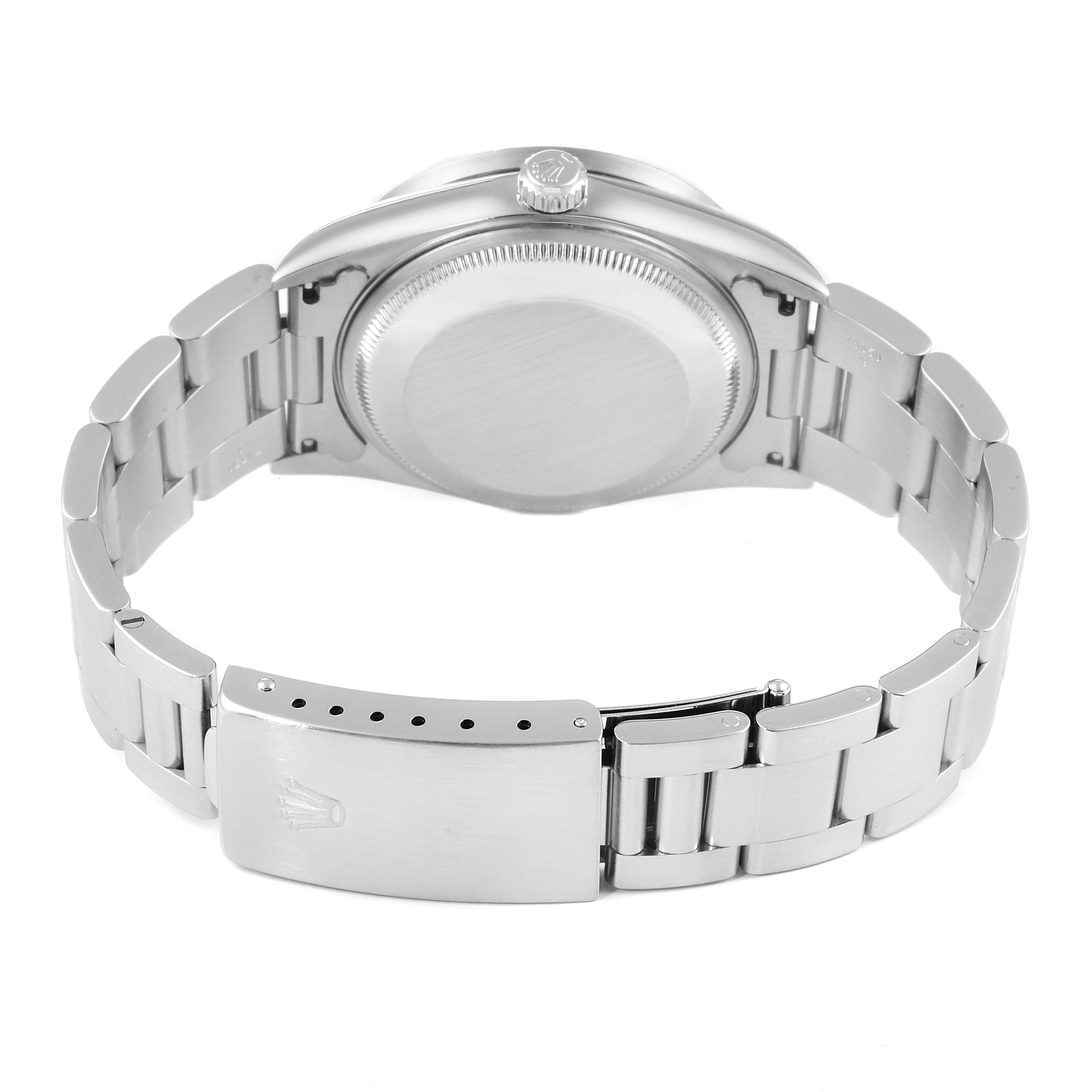 The image shows the back case and bracelet of a Rolex Date 15210 Men's Stainless Steel Pink Dial 15210 Men's Stainless Steel Pink Dial model watch from a rear angle.