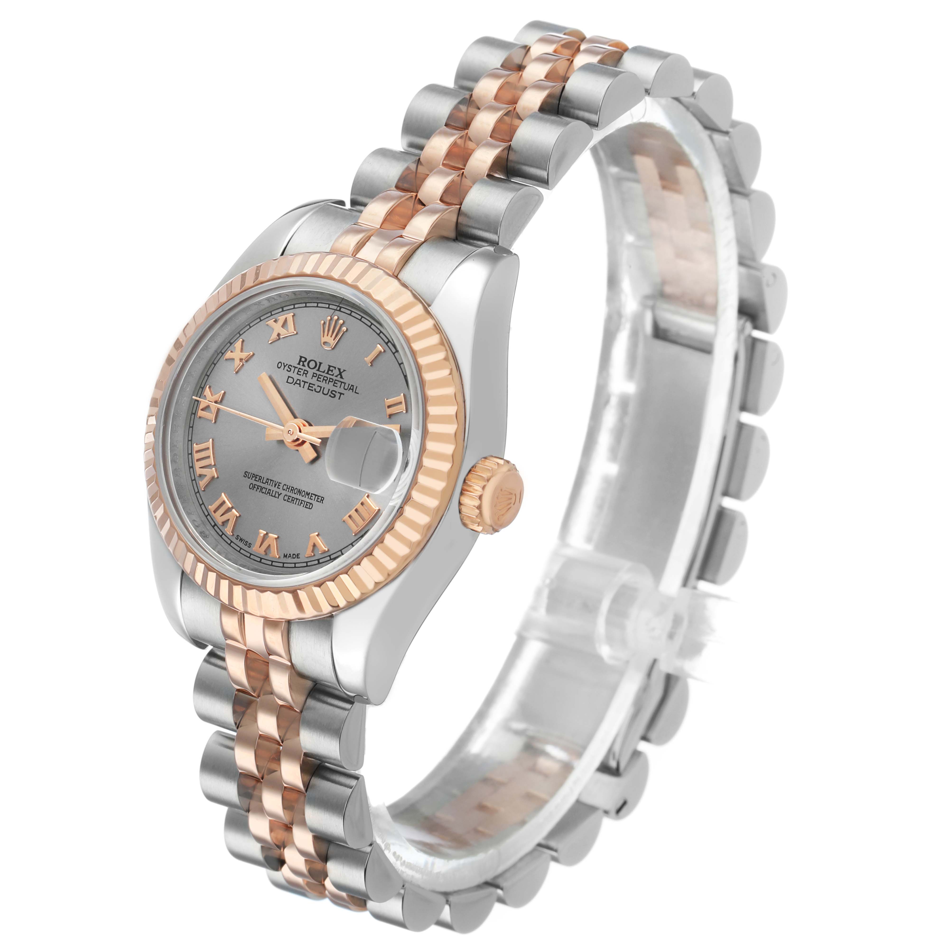 The Rolex Datejust 179171 Women's Steel and Gold (two tone) Silver Dial watch is shown at a 3/4 angle displaying the face, bracelet, crown, and fluted bezel.