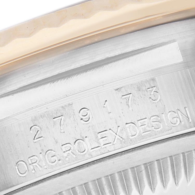The image shows a close-up of the engraved side of a Rolex Datejust 279173 Women's Steel and Gold (two tone) Champagne Dial 279173 Women's Steel and Gold (two tone) Champagne Dial watch case, highlighting the model number and branding.