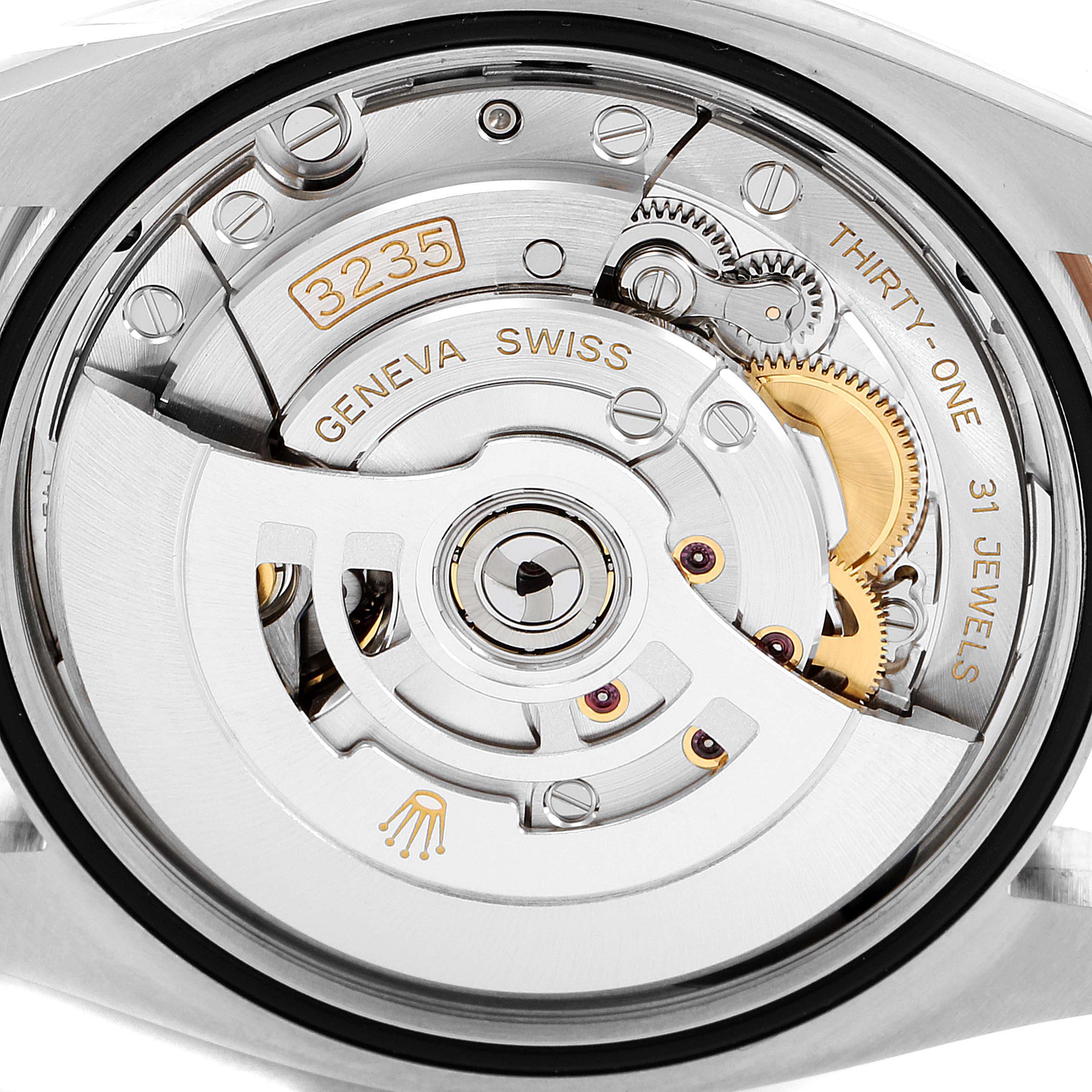 This image shows the transparent case back of a Rolex Datejust 126231 Men
s Steel and Gold (two tone) Grey Dial 126231 Men
s Steel and Gold (two tone) Grey Dial, revealing the 3235 movement.